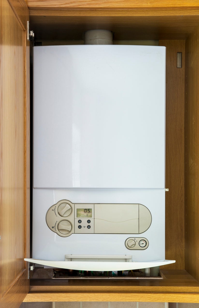 A modern condensing boiler recovers extra heat from waste gases, helping it run more efficiently than older non-condensing models.