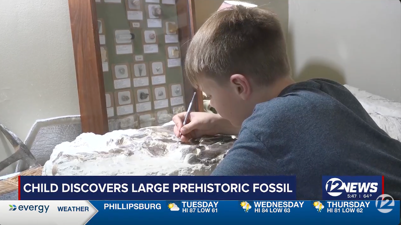 Corbin Bullard, 12, discovered a mosasaur fossil estimated to be 80 million years old while on a 4-H field trip in Wichita, Kansas