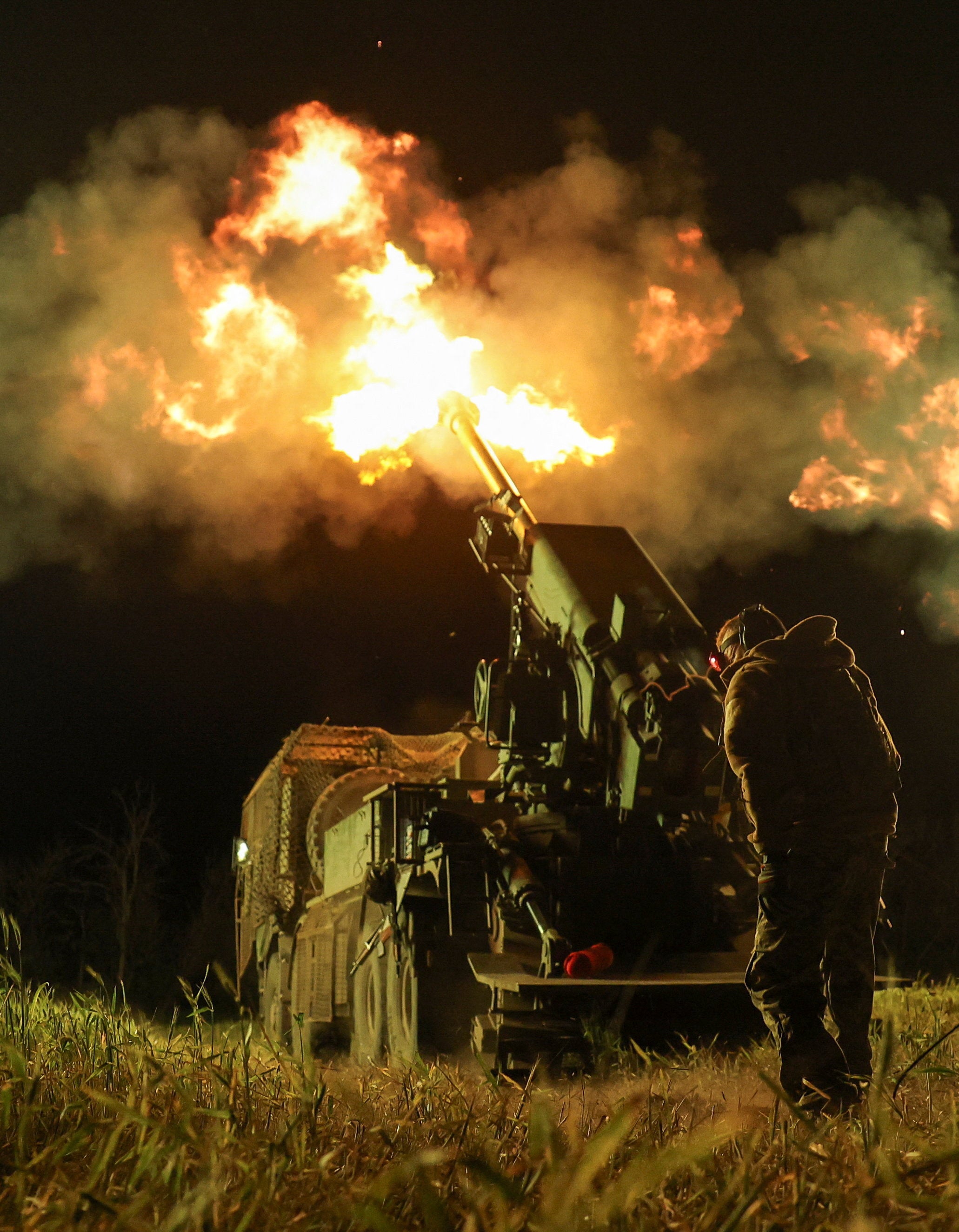 Ukrainians fire a 2S22 Bohdana howitzer on Russian positions in the Donetsk region on 27 May (Reuters)