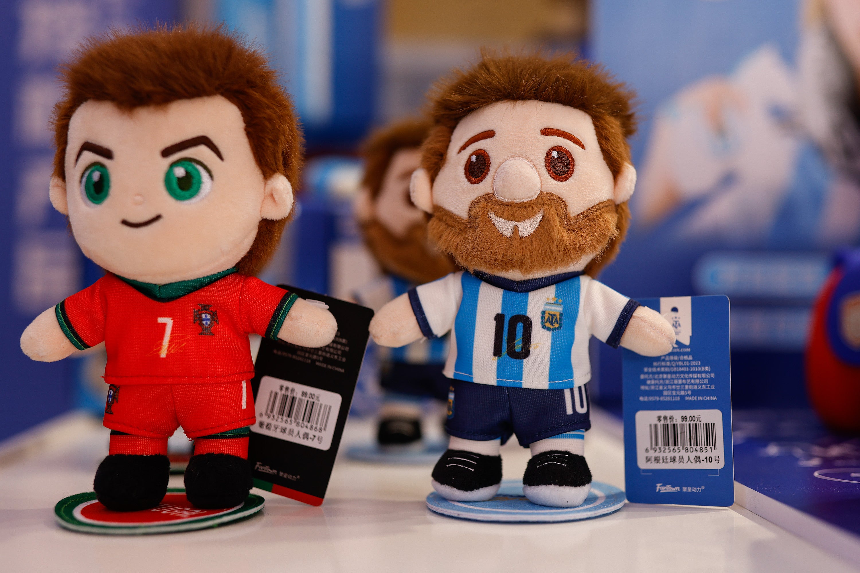 Toy figures of Messi and Ronaldo
