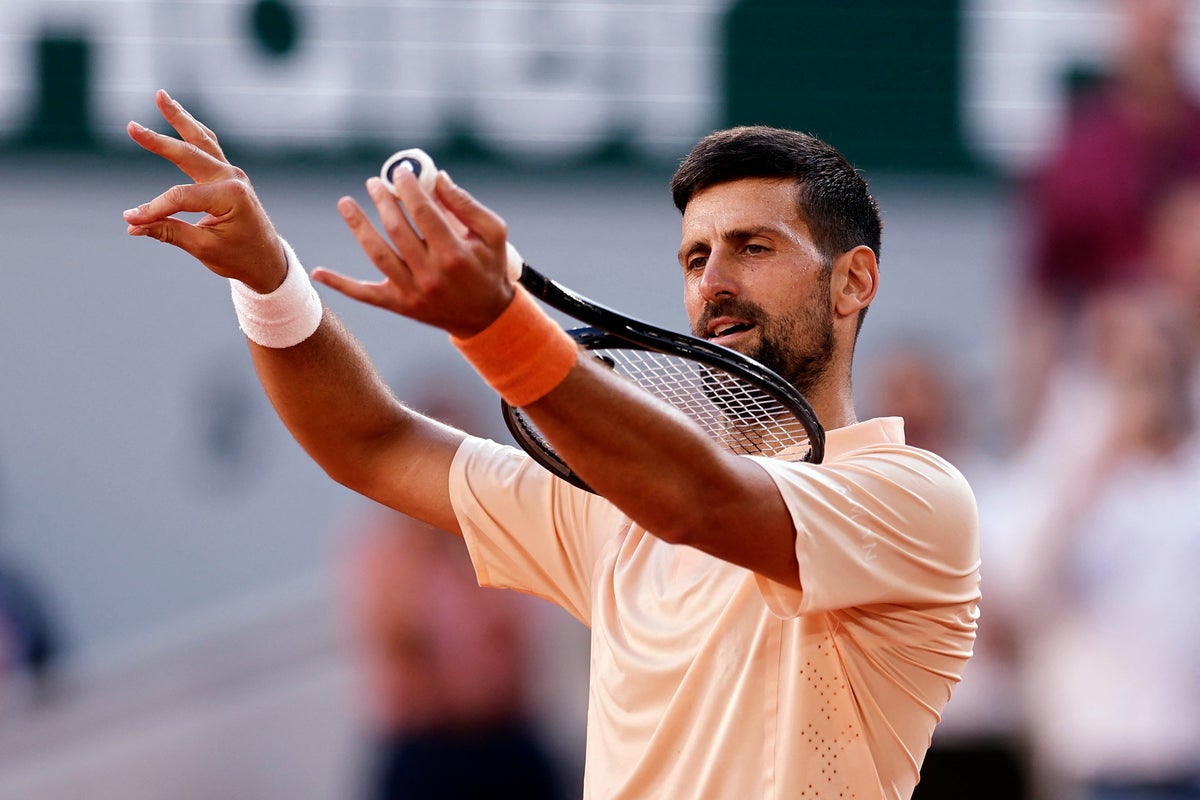 Djokovic overcomes scare to reach 21st consecutive French Open third round