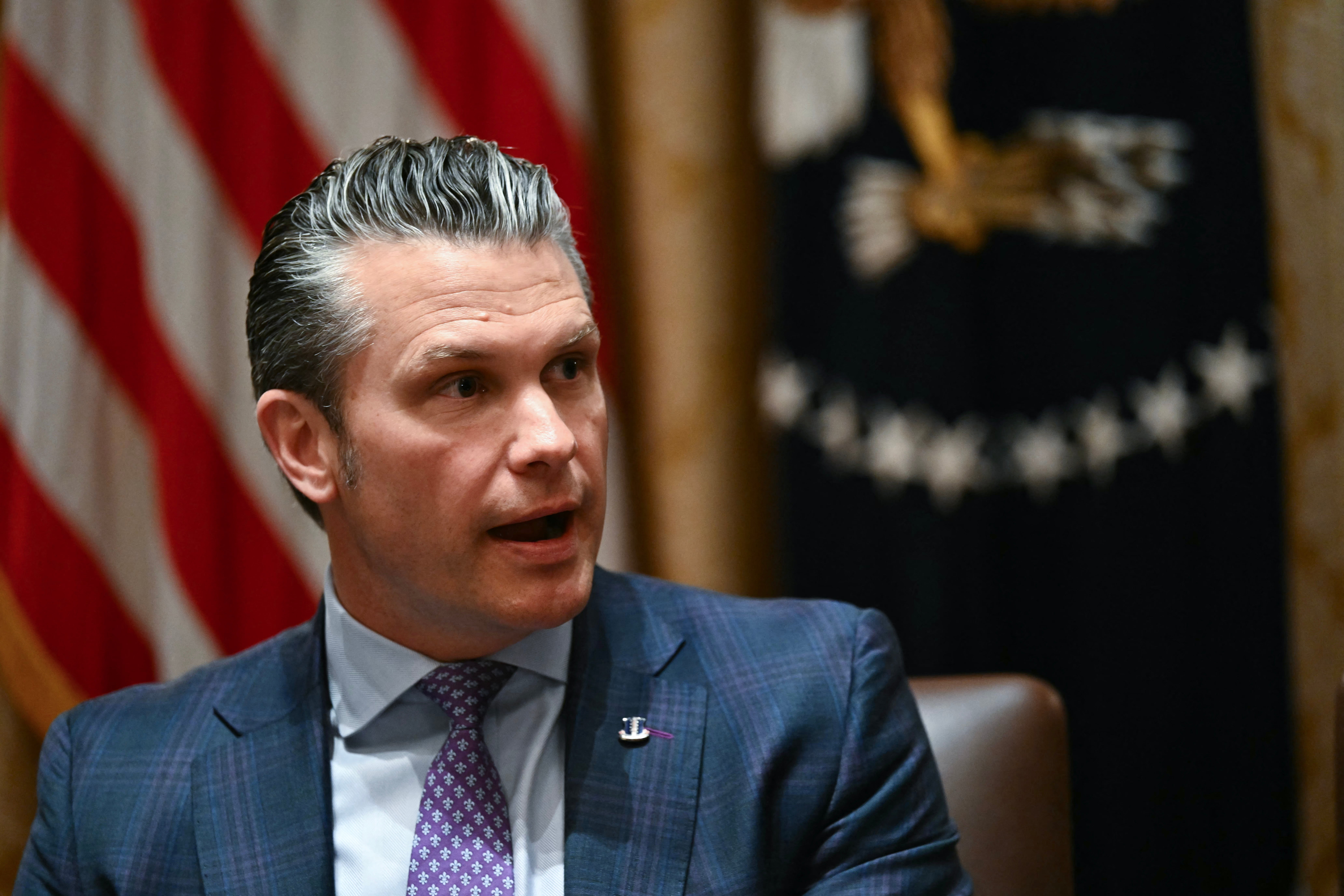 “He loves war,” Trump said of Defense Secretary Pete Hegseth, seated to his immediate left at Wednesday’s Cabinet meeting