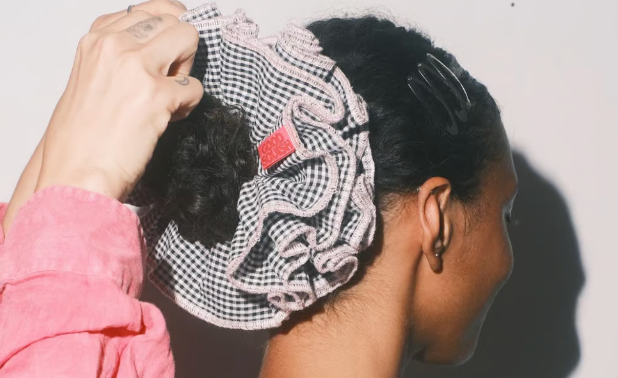 Oversized scrunchies add some fun to an otherwise simple look