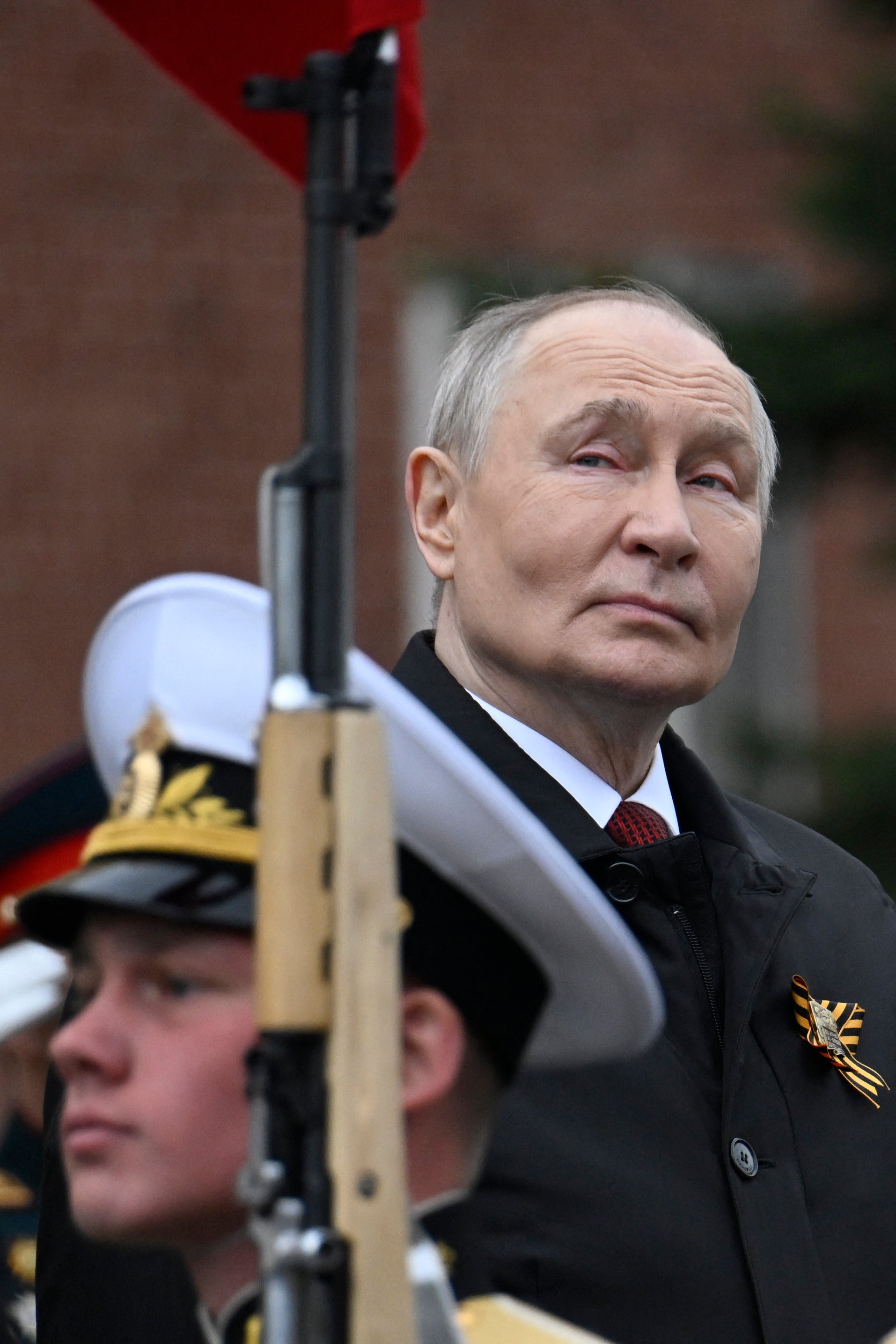 Russian President Vladimir Putin attends a ceremony to lay flowers at the Tomb of the Unknown Soldier by the Kremlin wall in central Moscow on May 9, 2026