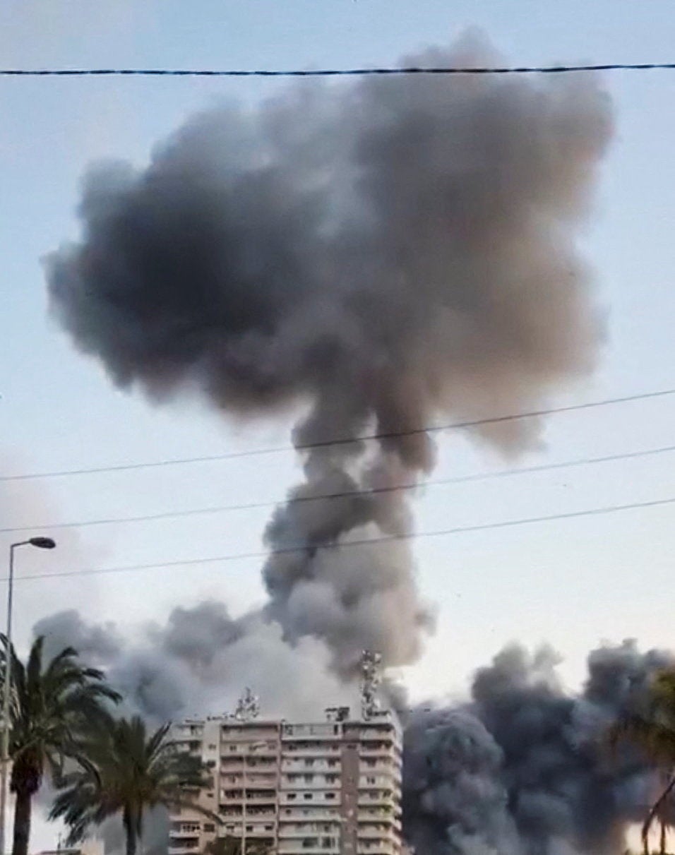 Smoke rises following a strike, as the Israeli military says it has begun striking Hezbollah infrastructure in southern Lebanon's Tyre, in Tyre, Lebanon