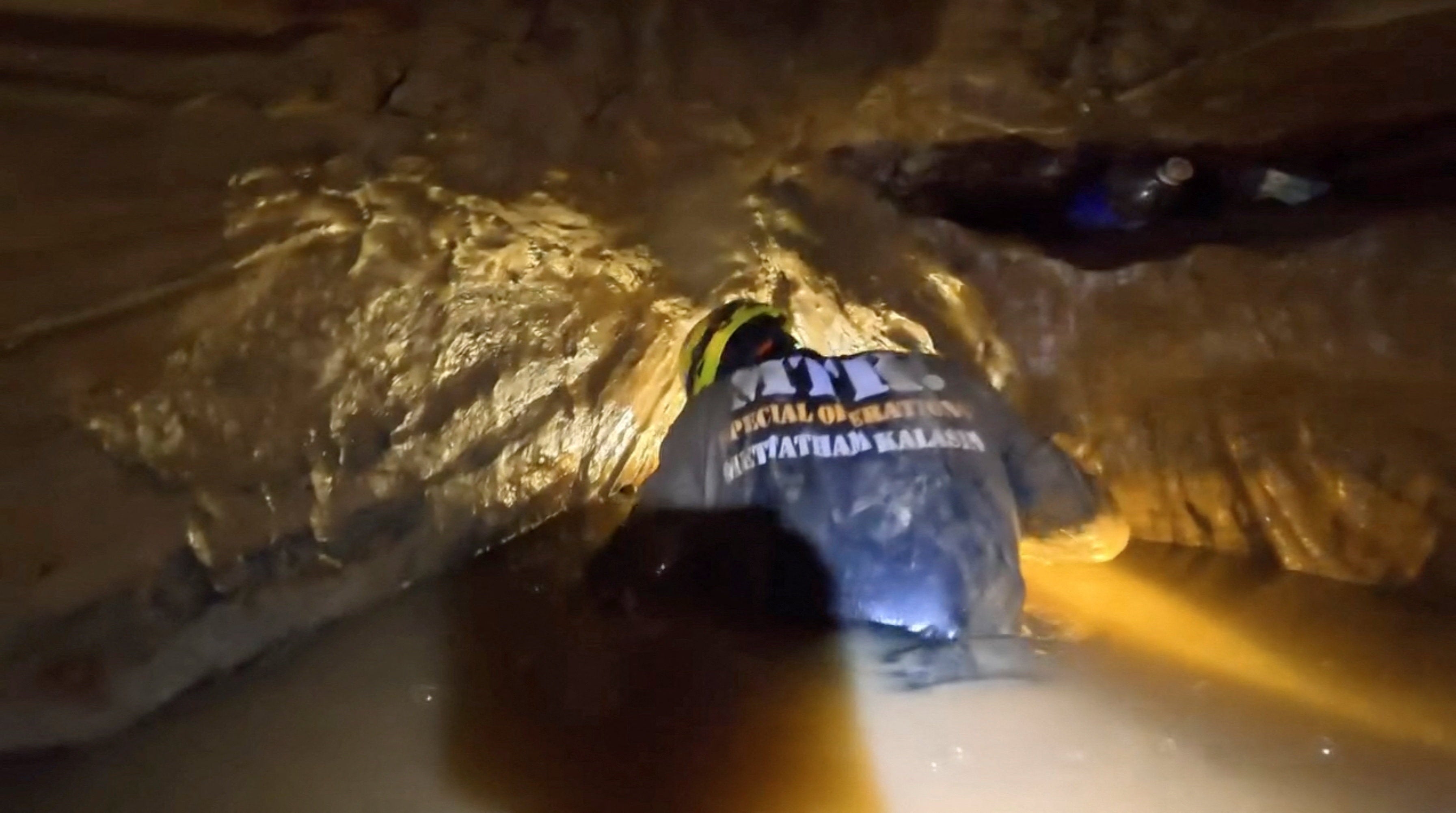 A rescue workers inside the cave in Xaisomboun, Laos (Reuters)