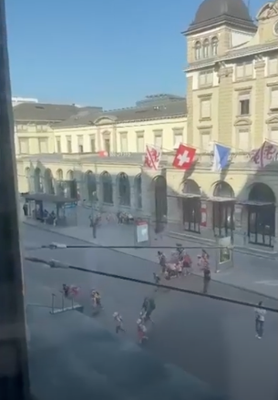 People scatter amid a reported knife attack in Switzerland