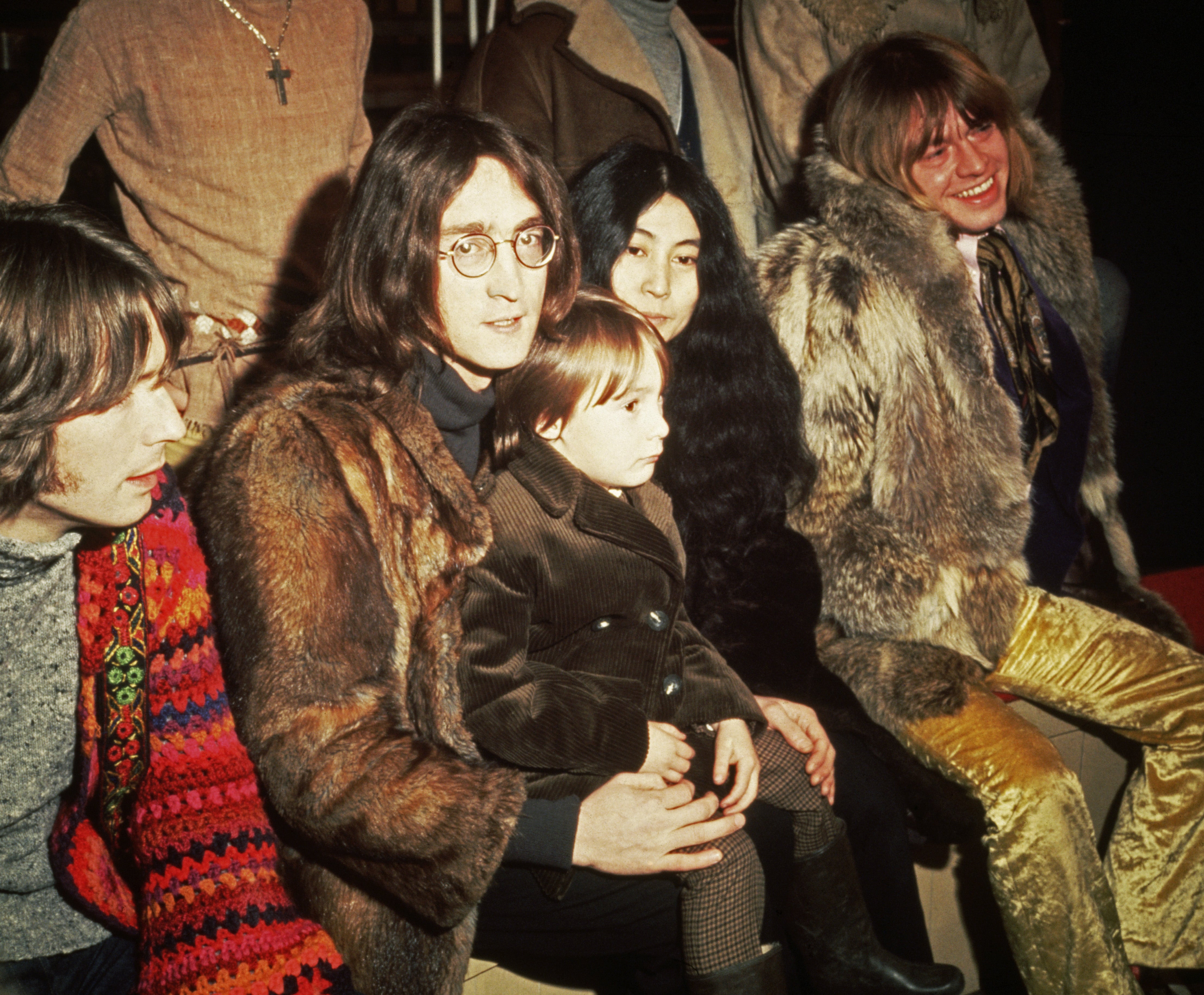 Eric Clapton, John Lennon (1940 - 1980) - with his wife, artist Yoko Ono and his son Julian - and Brian Jones (1942 - 1969) pictured at a press conference at Internel Studios in Stonebridge Park, Wembley, for the Rolling Stones' Rock & Roll Circus project