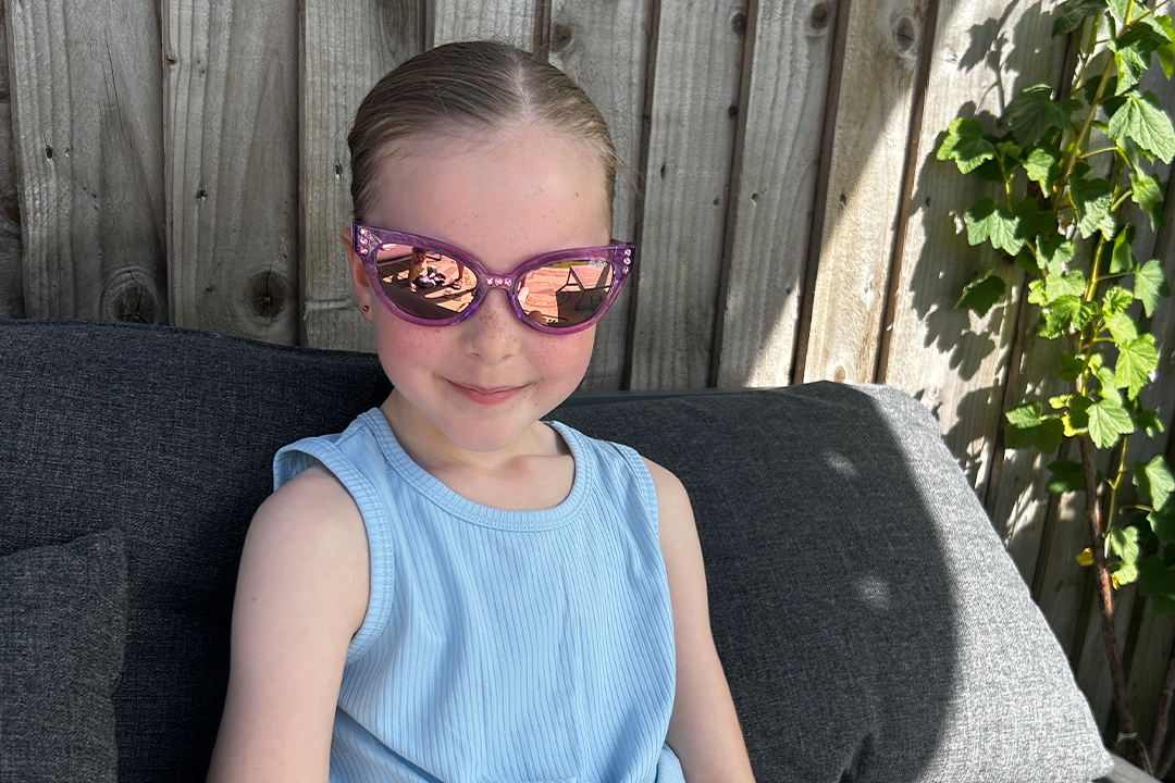 My seven-year-old tester adored these sunglasses (Rebecca Moore/The Independent)