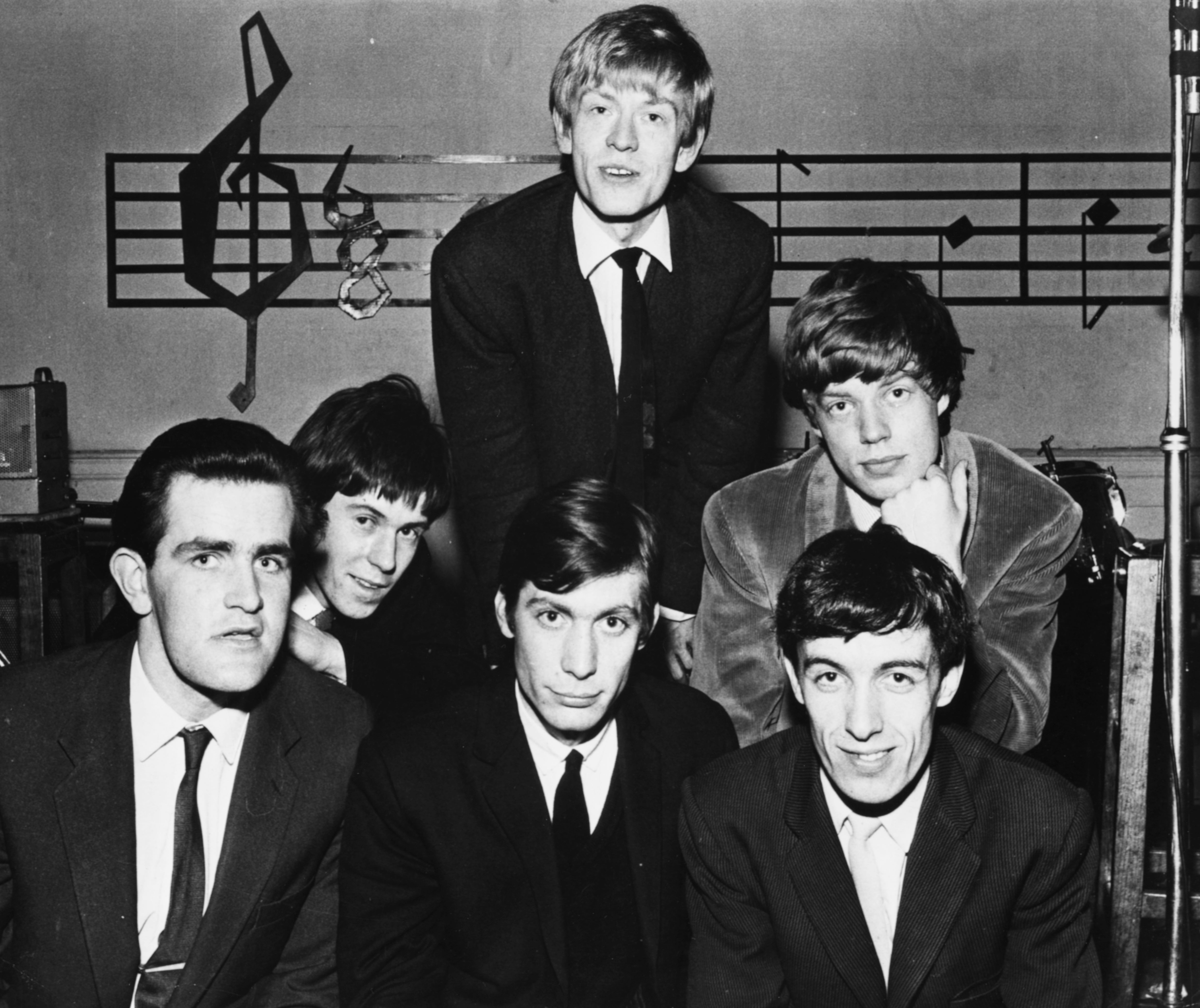 The Rolling Stones in 1963, clockwise from top: Brian Jones, Mick Jagger, Bill Wyman, Charlie Watts, Keith Richards and Ian Stewart