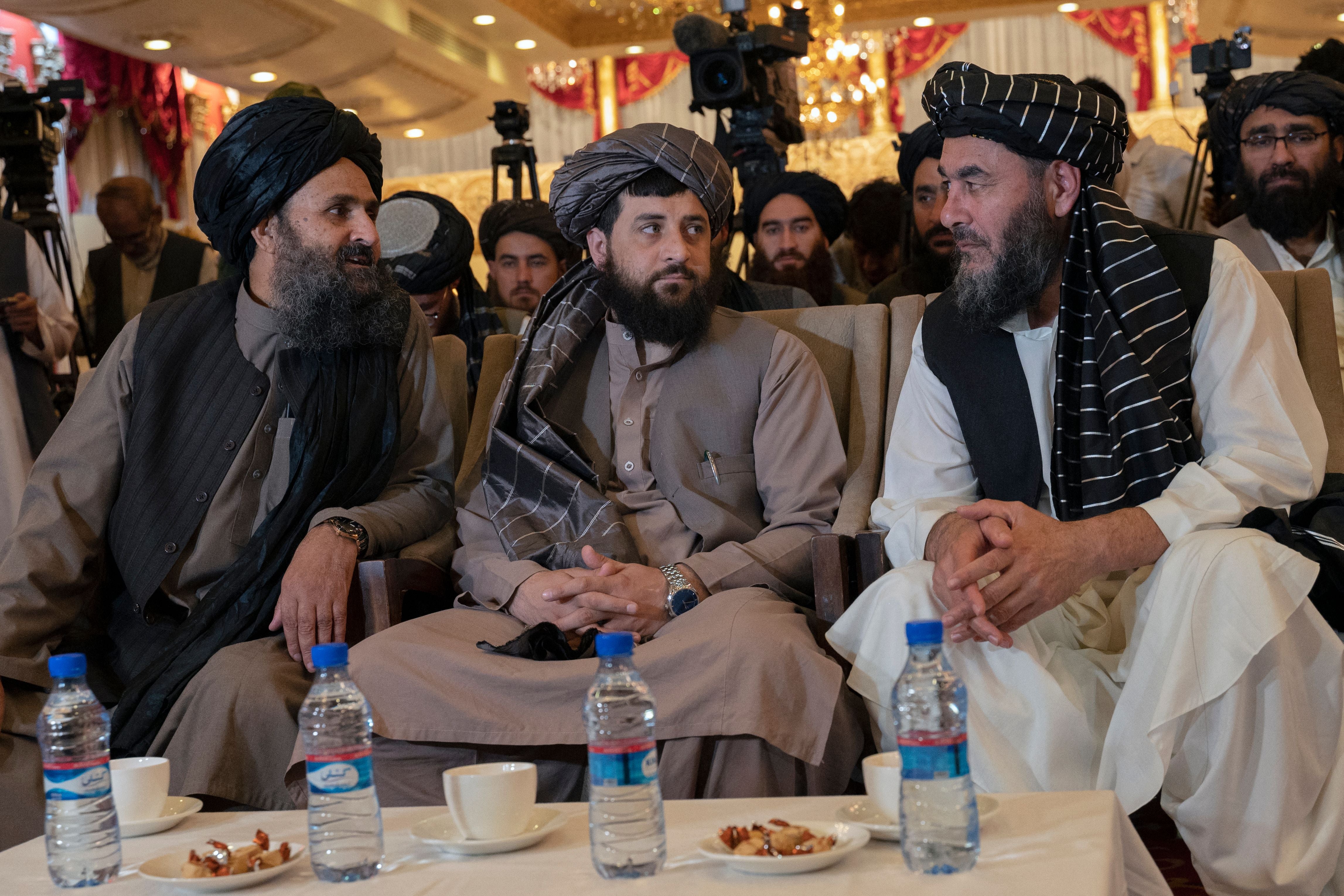 Acting defence minister of Afghanistan Mohammad Yaqoob (L) and Taliban's acting first deputy prime minister Abdul Ghani Baradar (L) during a press event in Kabul
