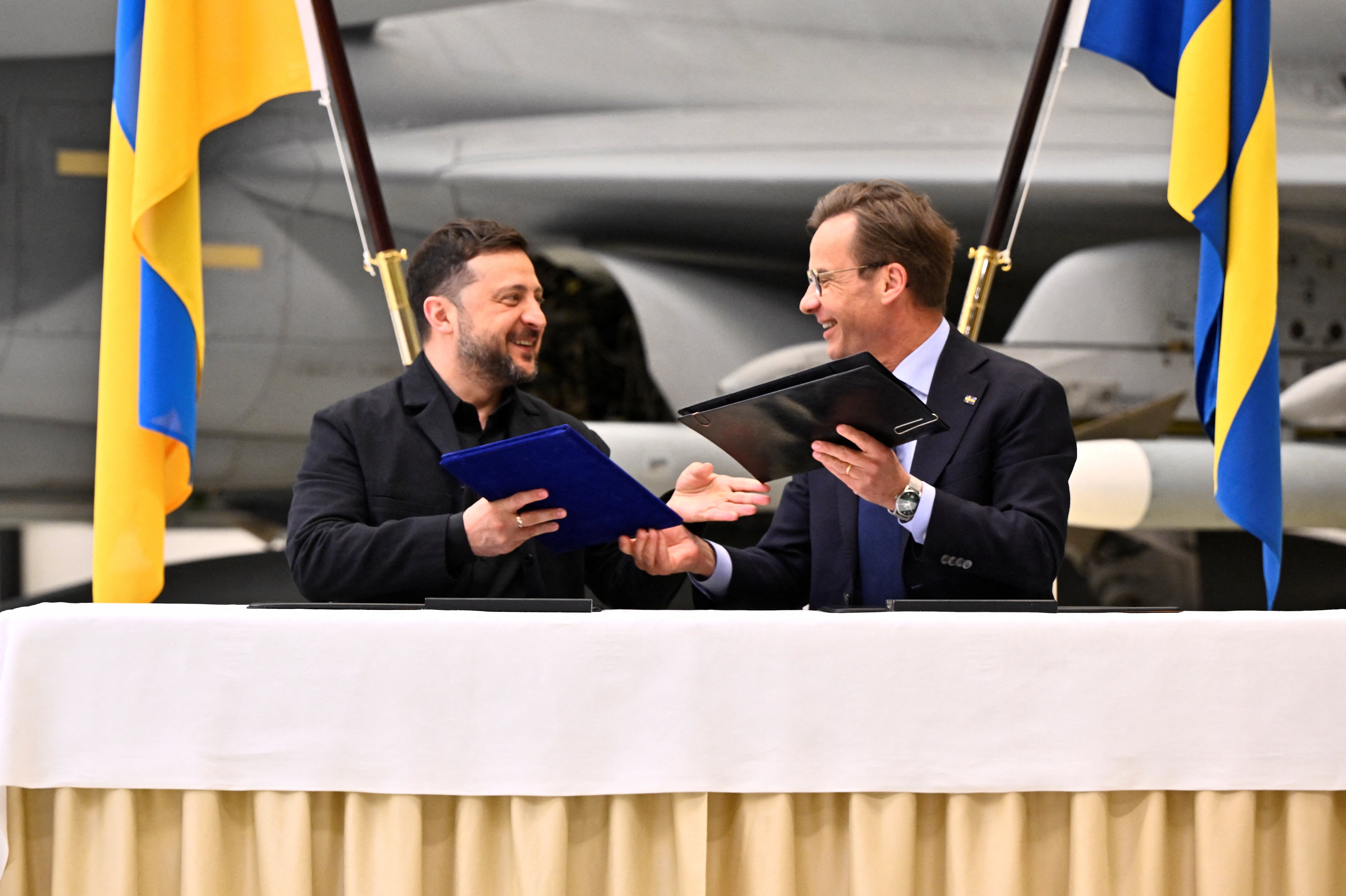 Sweden will procure 20 Gripen fighter jets for Kyiv, it was announced as Zelensky (left) met Swedish PM Ulf Kristersson (right) (Reuters)