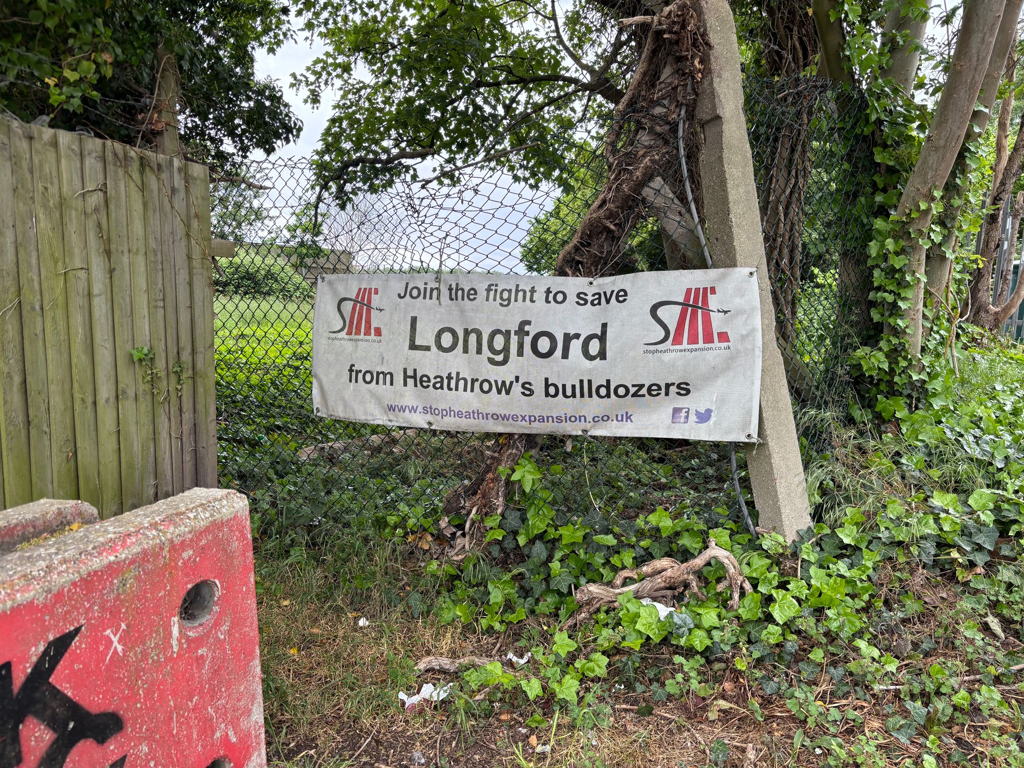Signs opposing the expansion of Heathrow are dotted around the village of Longford
