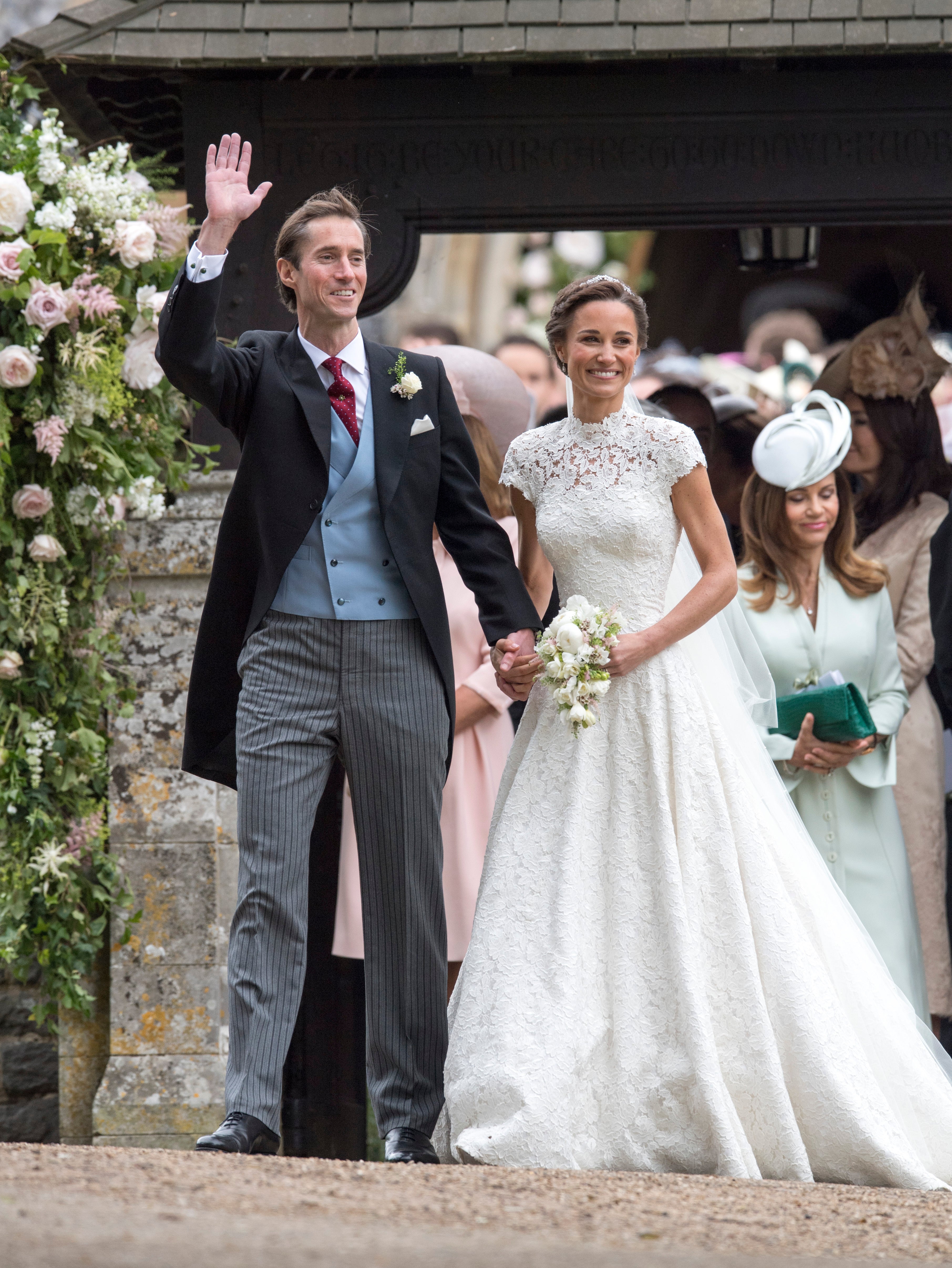 Pippa Middleton and her husband James Matthews leaving St Mark’s church in Englefield, Berkshire, following their wedding. (PA)