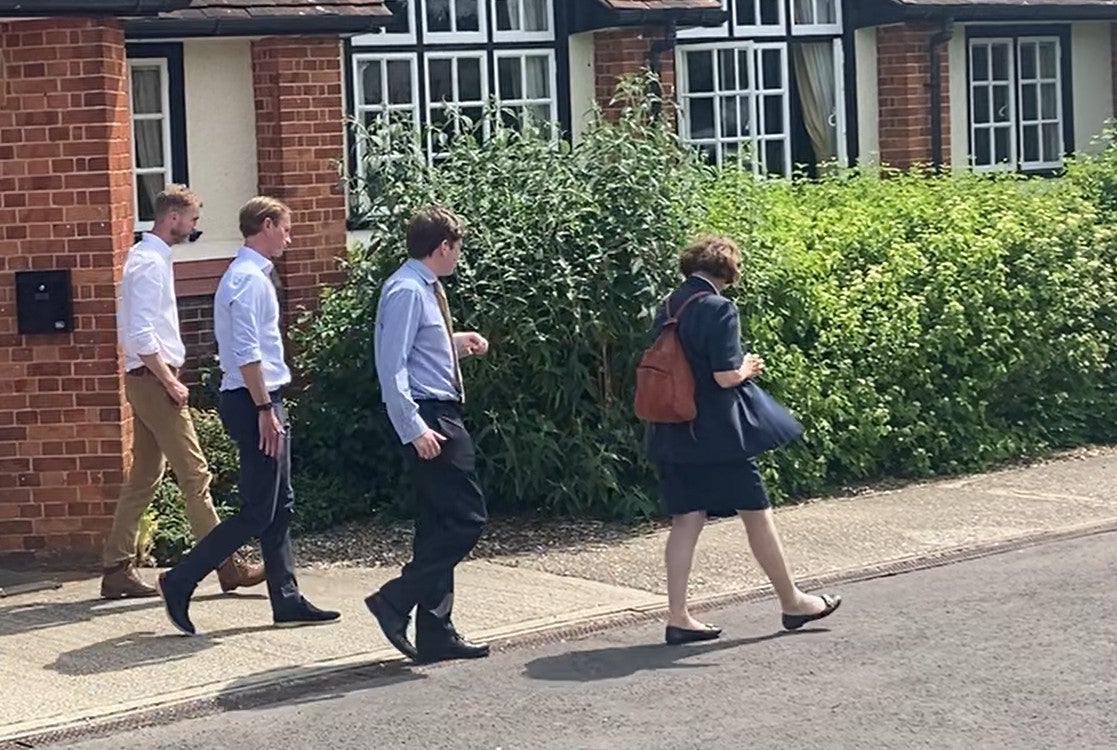 James Matthews (second left), the Princess of Wales's brother-in-law, leaving Kintbury Coronation Hall, Kintbury, Hungerford , after telling a planning inquiry there is a need for a higher level of security due to his family's high public profile. (PA)