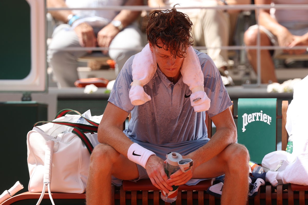 Jannik Sinner suffers dizzy spell in French Open heat during dramatic match