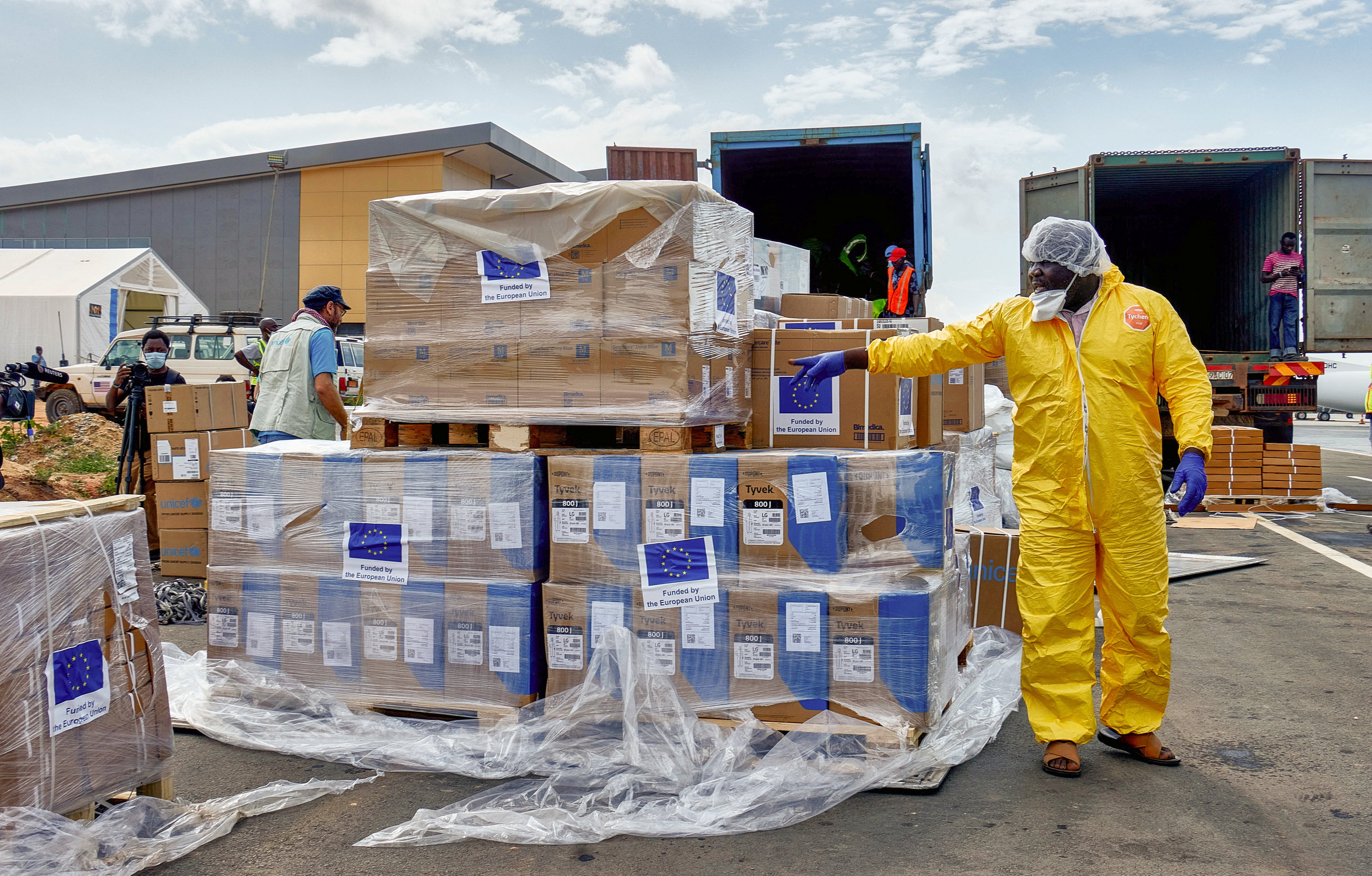 Unicef staff and airport workers load trucks with aid from the European Civil Protection and Humanitarian Aid Operations (ECHO) for the Ebola outbreak caused by the Bundibugyo strain, at Bunia National Airport in Bunia, Ituri province, Democratic Republic of Congo (Reuters)