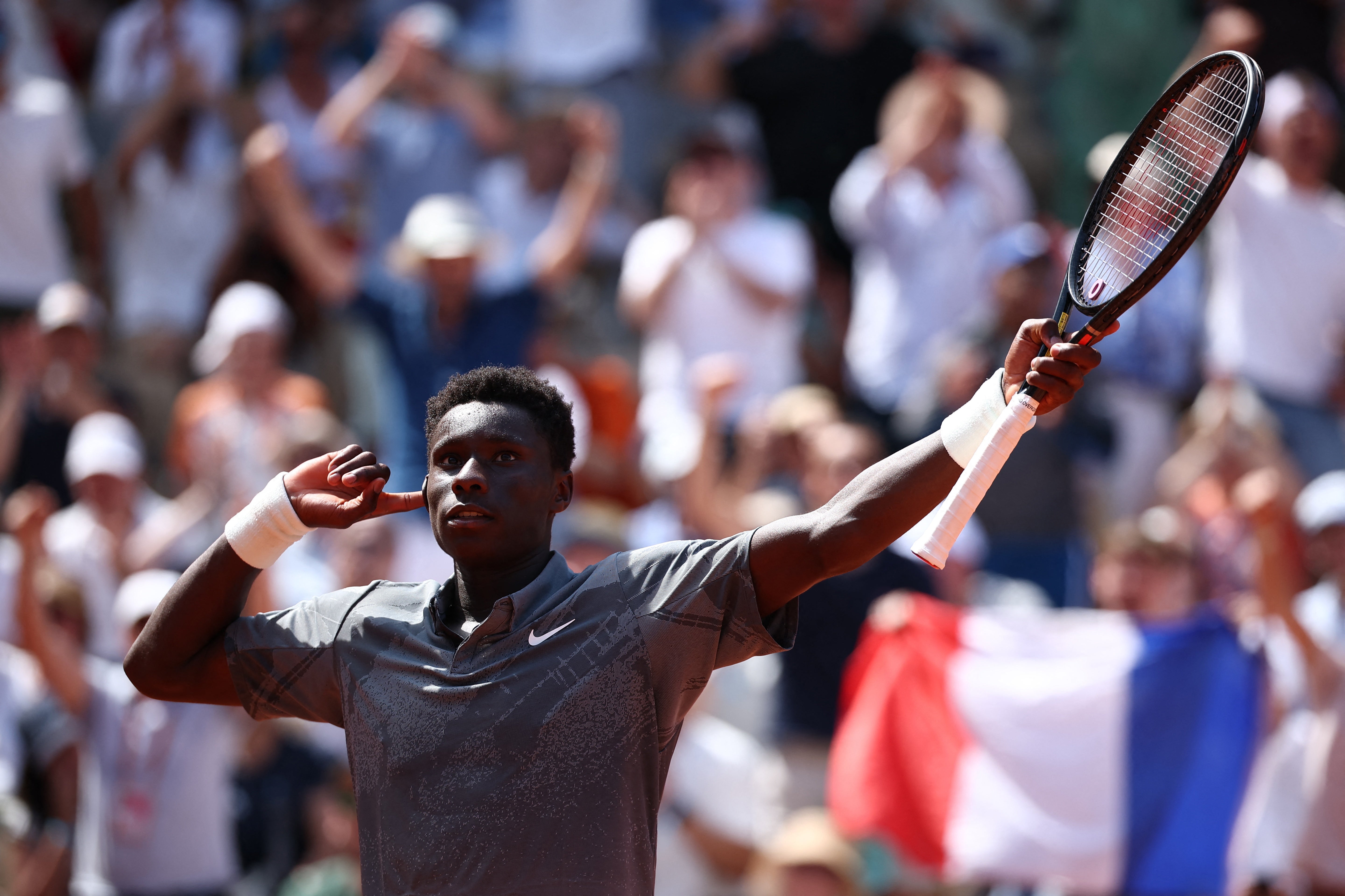 Kouame whipped the crowd into a frenzy during his astonishing win to reach the third round