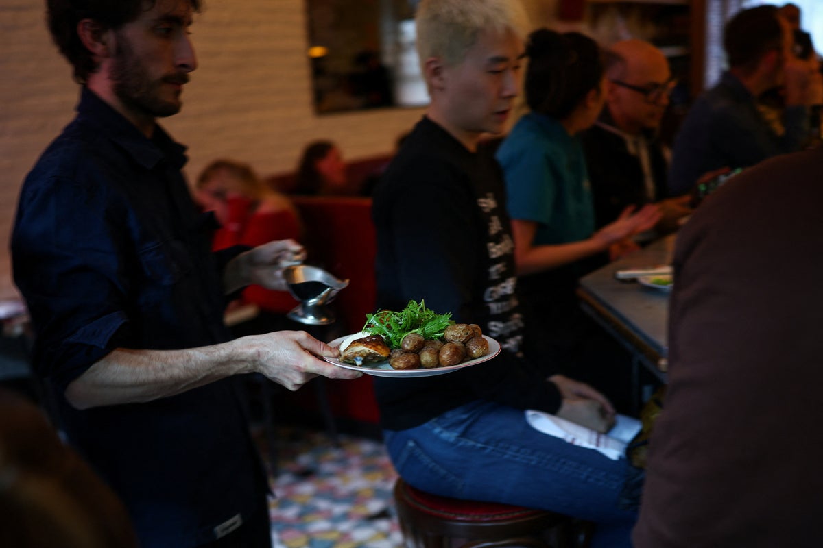 US restaurants add mandatory tips to bills before foreign visitors arrive for World Cup