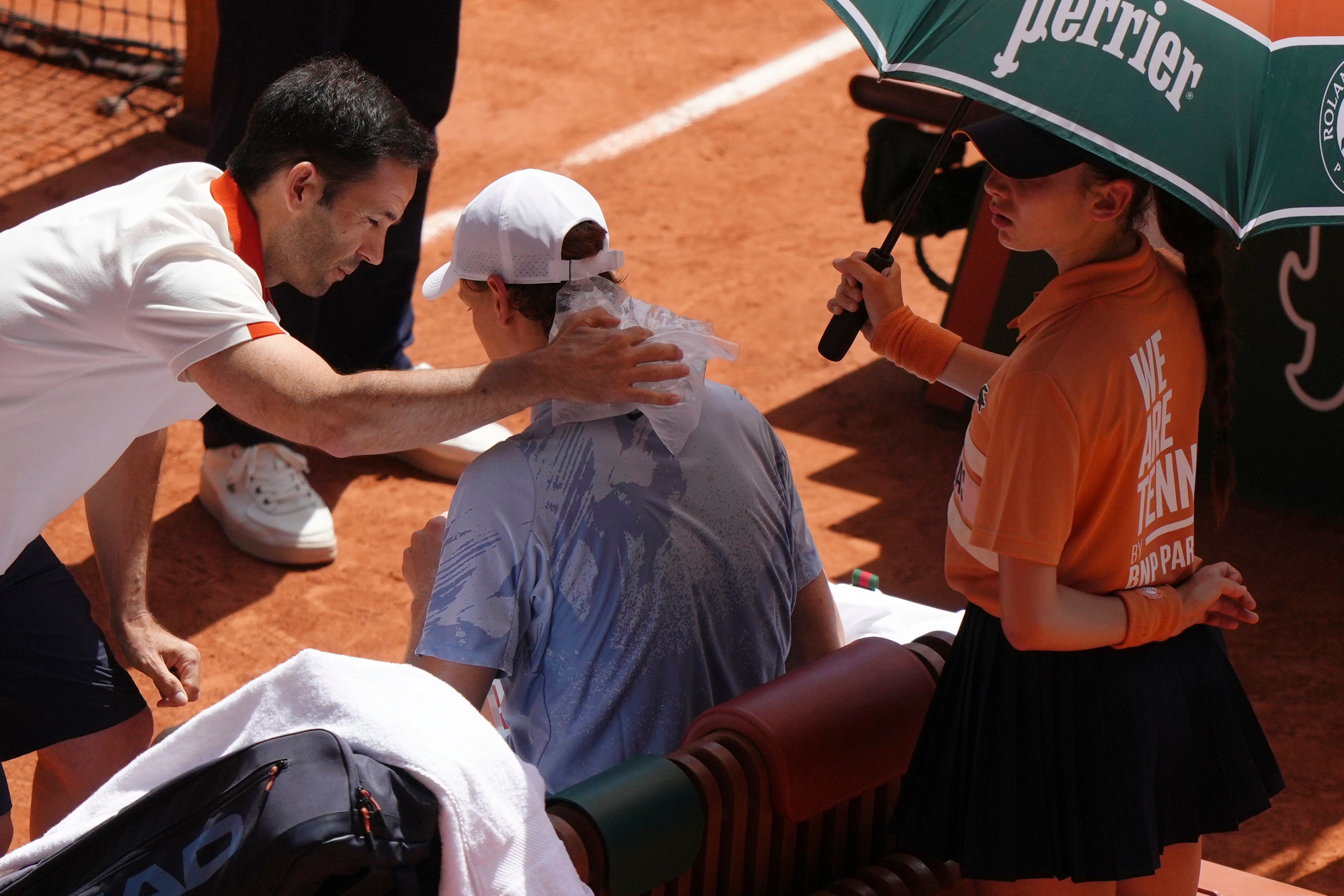 Jannik Sinner receives treatment (Aurelien Morissard/AP)