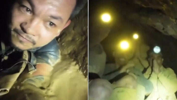 Rescuers squeeze through tiny gaps to reach trapped villagers in flooded Laos cave (AP)