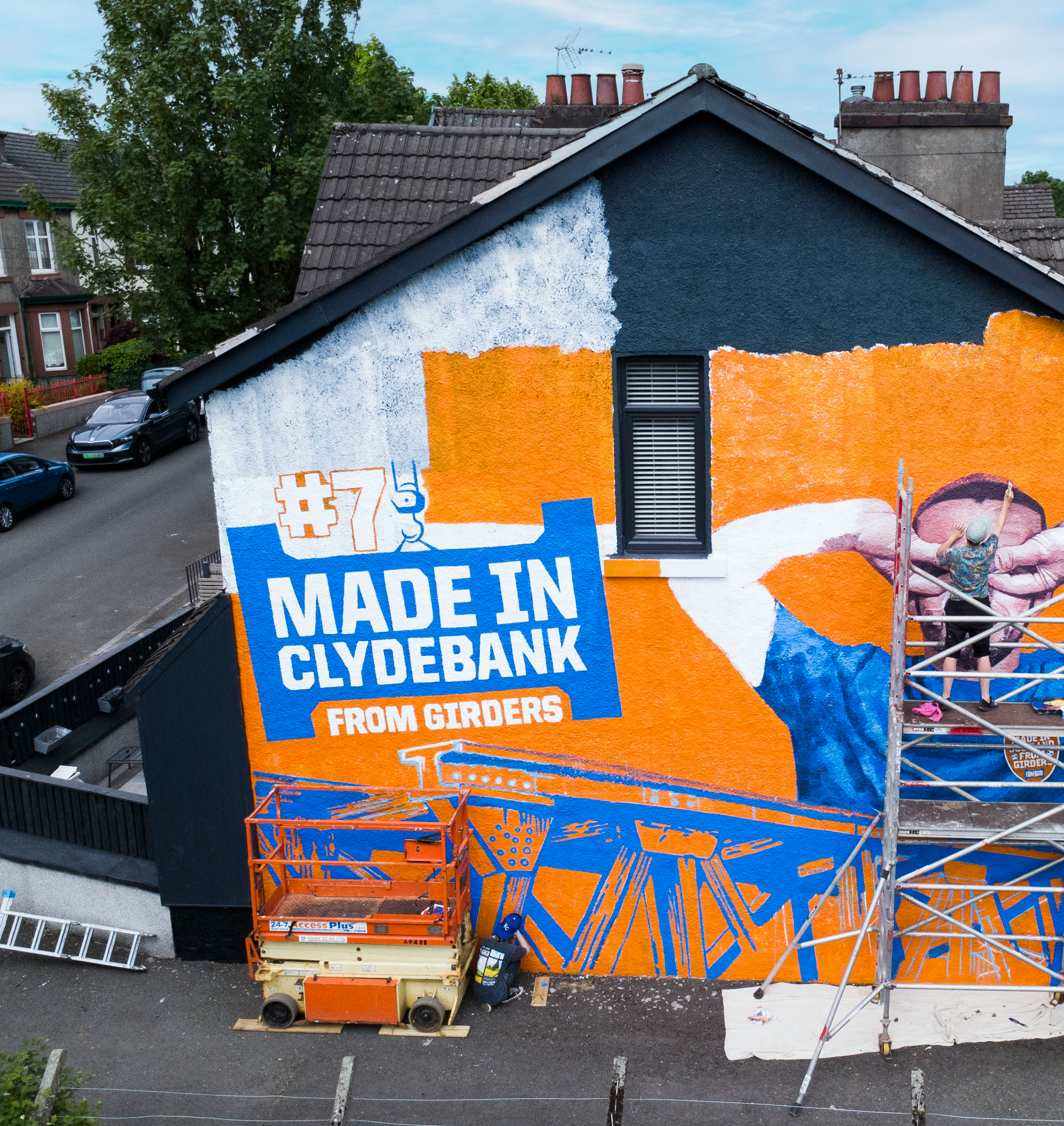 New painting of Scotland legend John McGinn by Irn-Bru encourages bold supports to offer up their own house for mega mural. (John Doe Hub/PA)