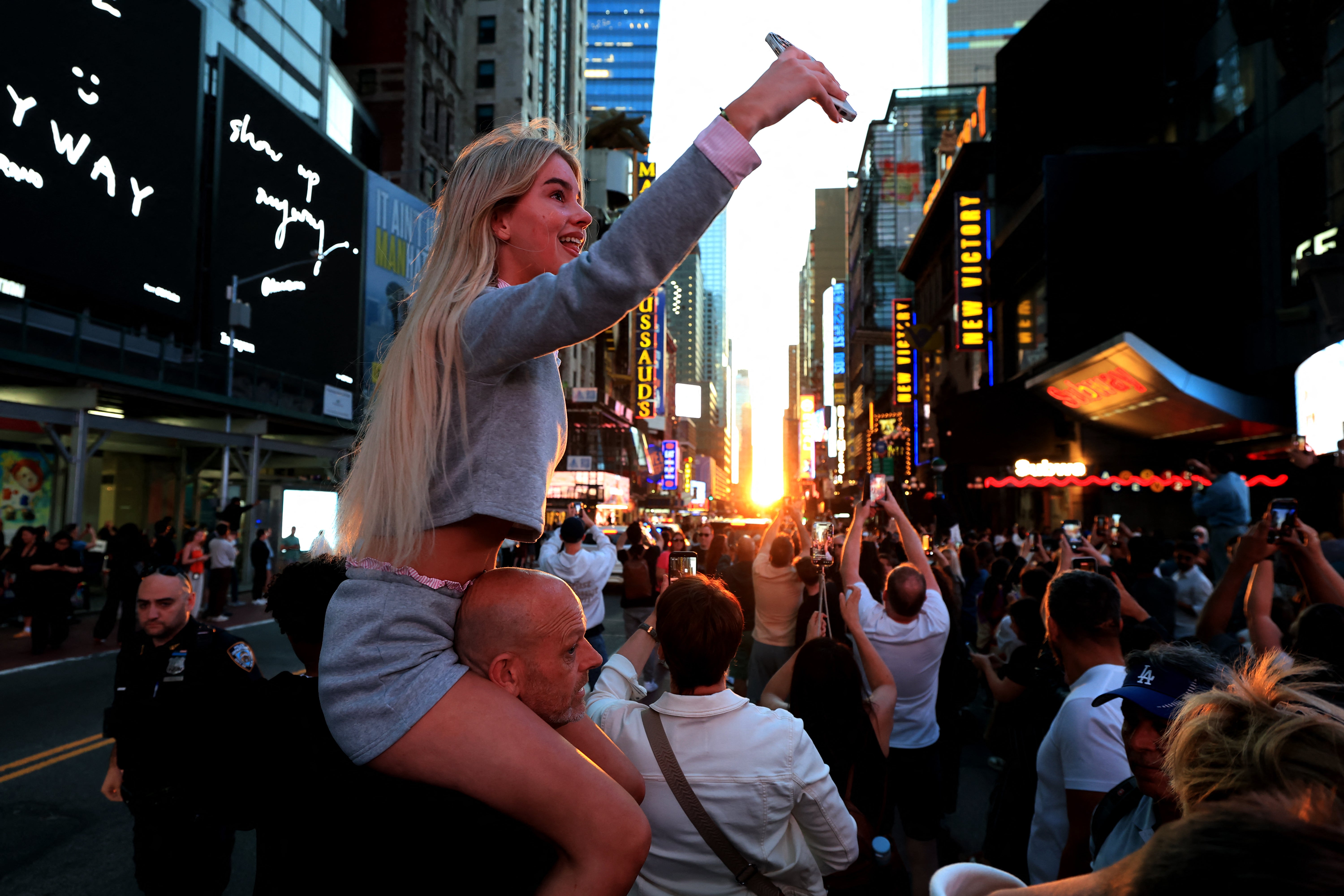 The dramatic spectacle was just the first of the year. A fuller version of the setting sun is expected to be seen between New York’s famed skyscrapers on Friday