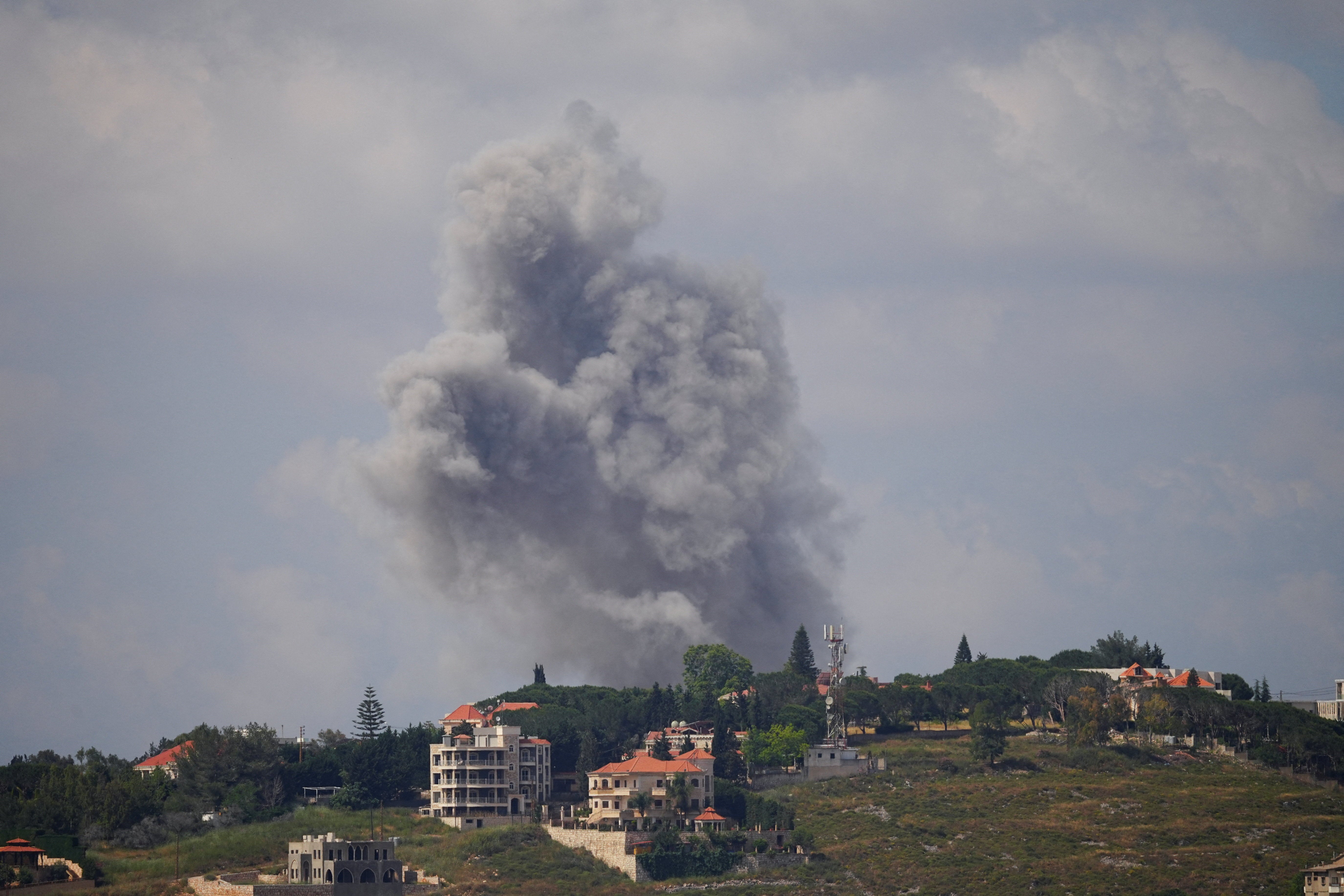 Smoke billows from southern Lebanon following an Israeli strike, as seen from Nabatieh, Lebanon, May 29 (Reuters)