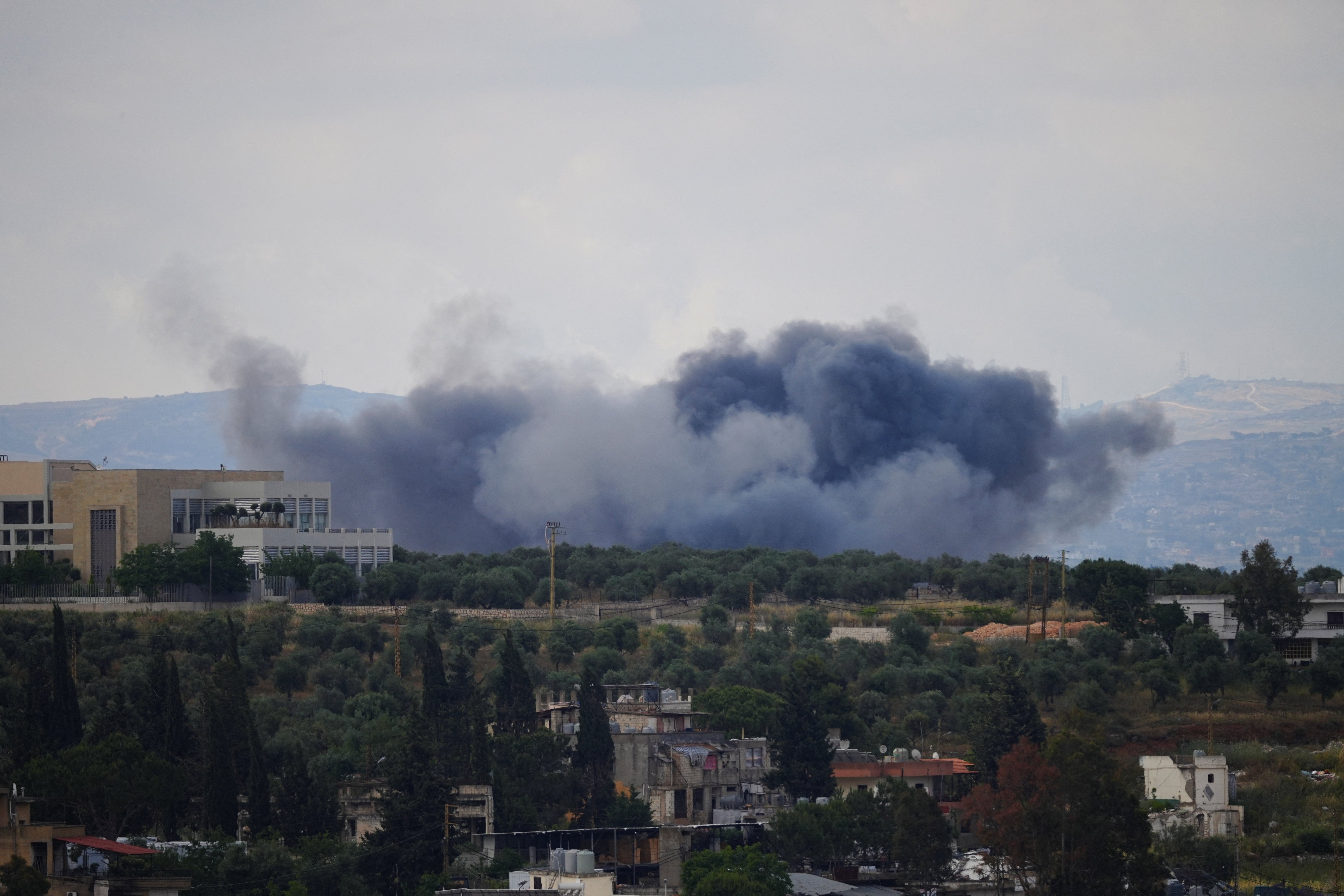 Smoke billows from southern Lebanon following an Israeli strike, as seen from Nabatieh, Lebanon, May 29 (Reuters)