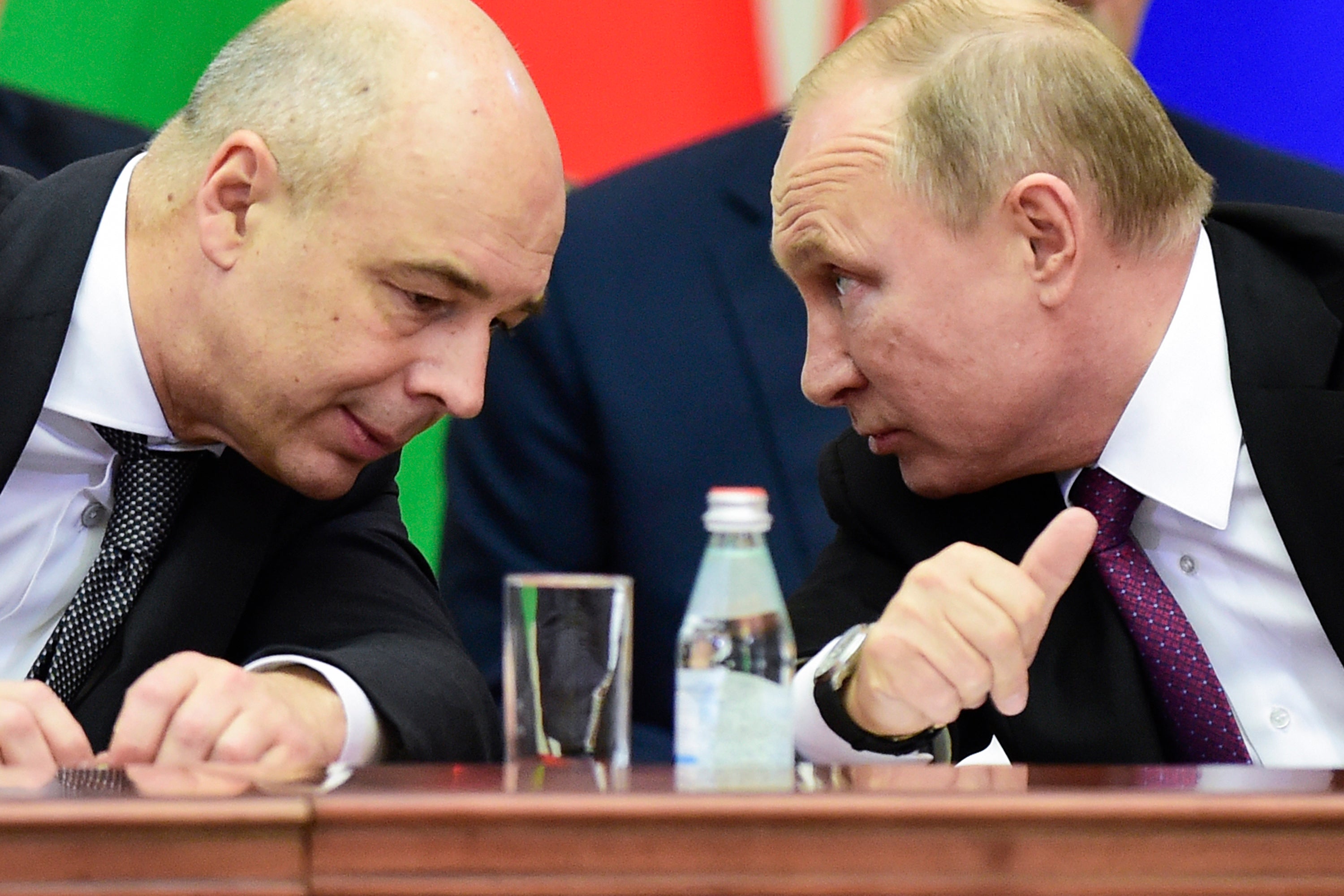 Russian President Vladimir Putin and finance minister Anton Siluanov in 2018 (AFP/Getty)