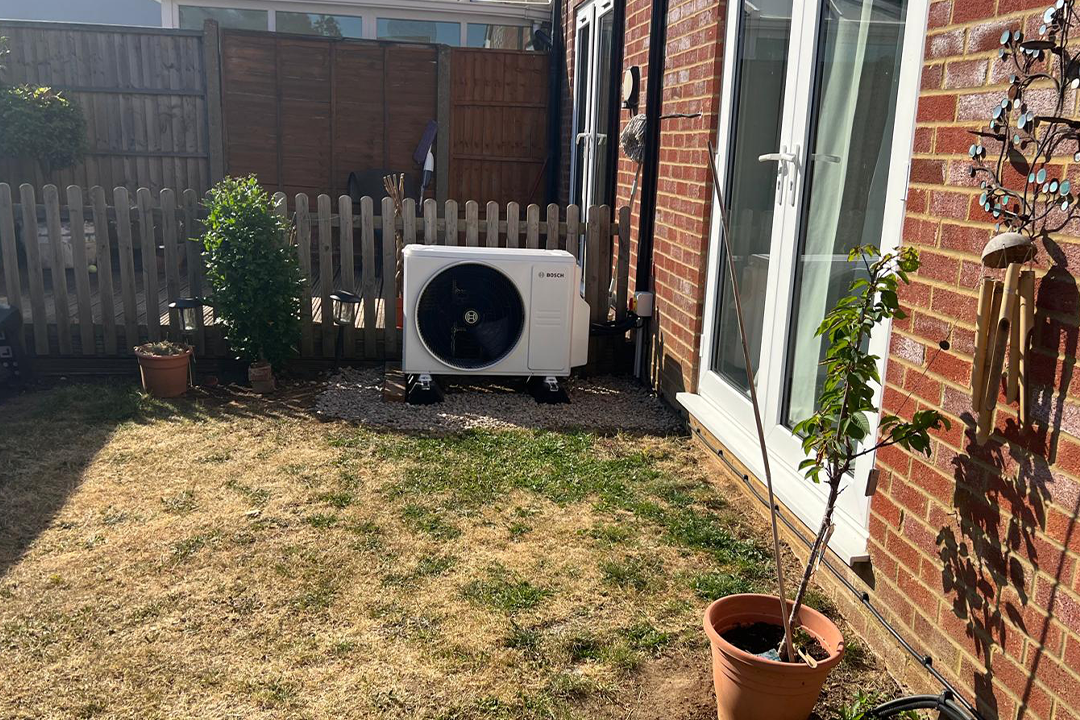 The outdoor unit isn’t the most aesthetically pleasing (Alex Lee/The Independent)