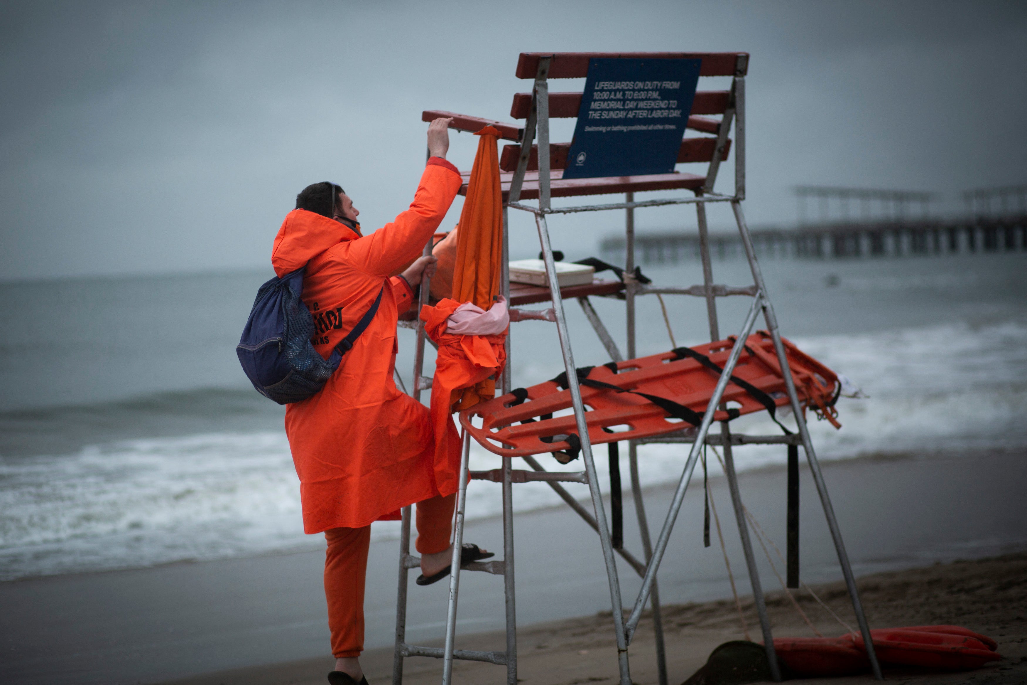 “I believe the issue with rain on holiday weekends is simply luck of the draw,” Steve Decker, an associate professor at Rutgers University said, explaining the increasingly frequent sight of beach lifeguards in rain gear.