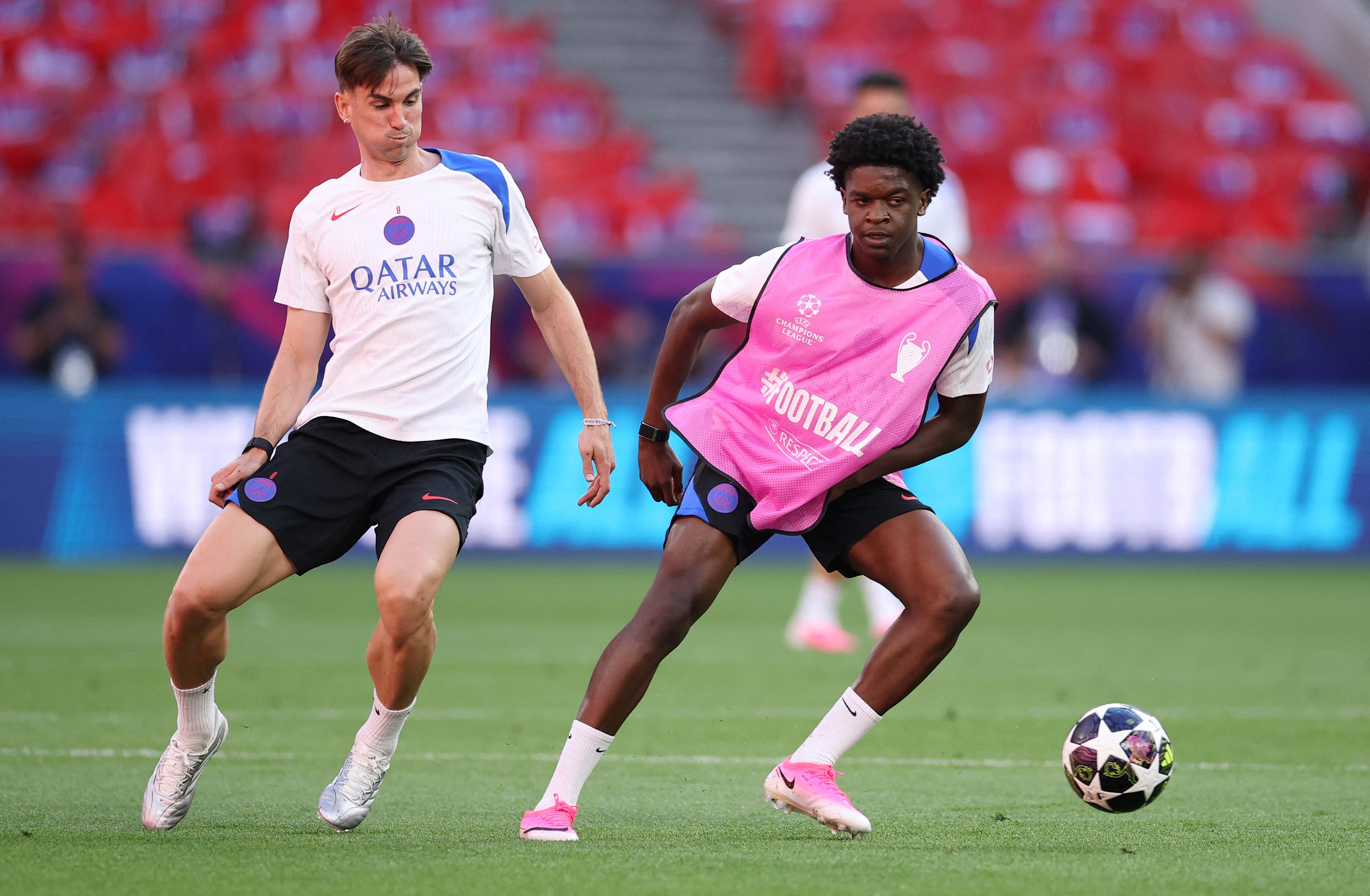 Paris Saint-Germain's Fabian Ruiz and Quentin Ndjantou during training