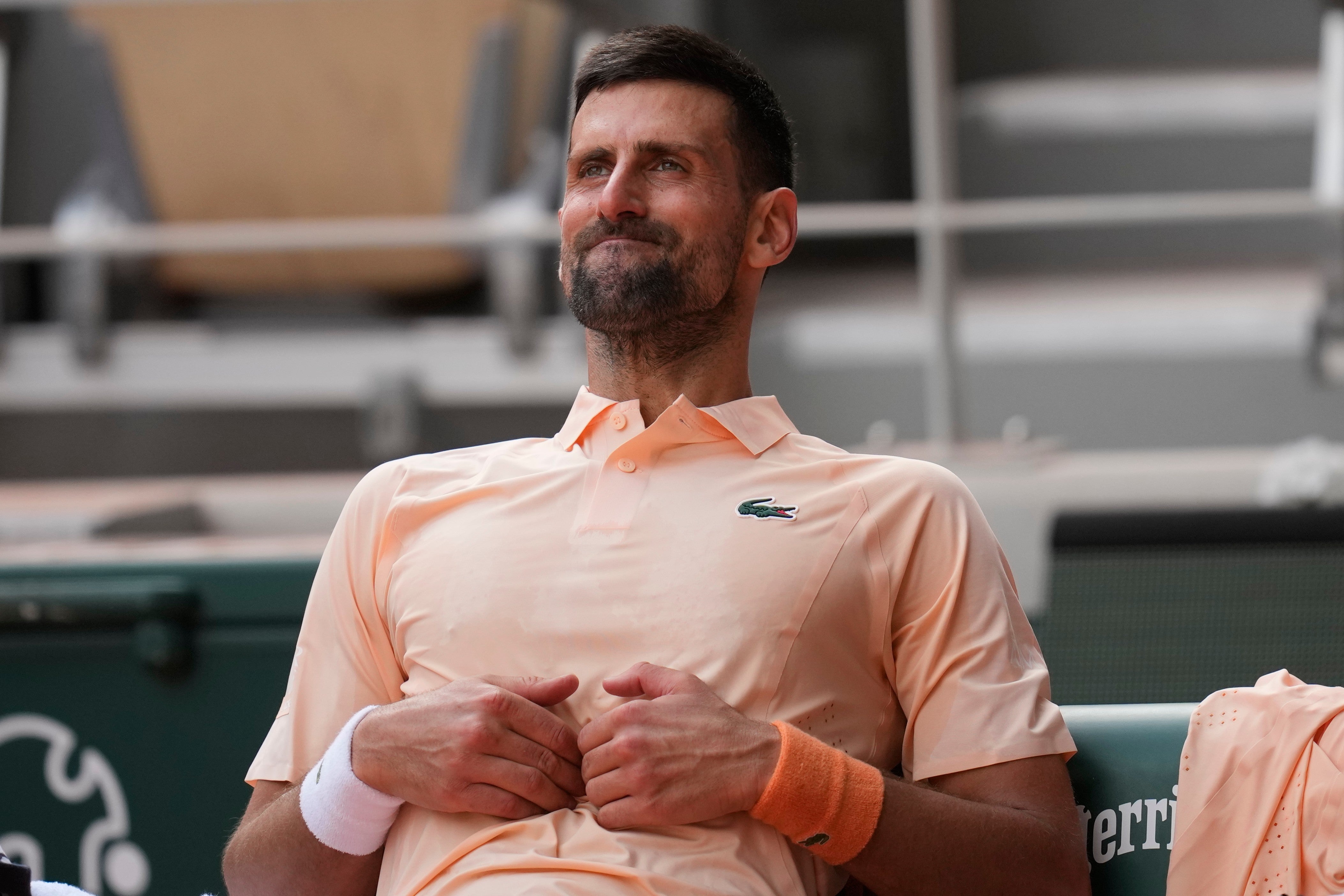 Djokovic pressing into his stomach - is that an issue? (AP)
