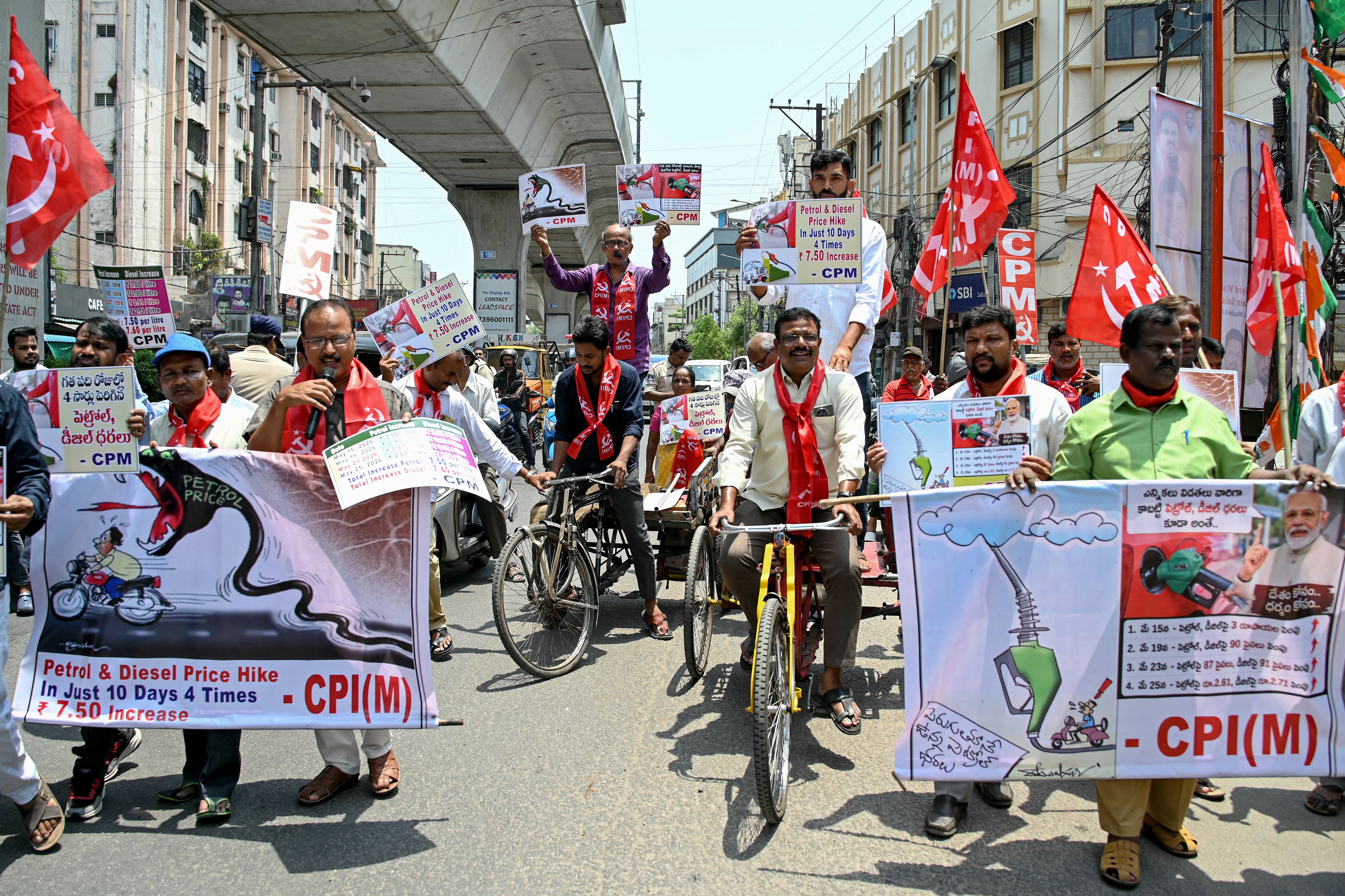 Communist Party of India (Marxist) CPI(M) members hold banners and placards during a protest over the hike in fuel prices in Hyderabad earlier this week, amid global energy crises triggered by the Middle East war