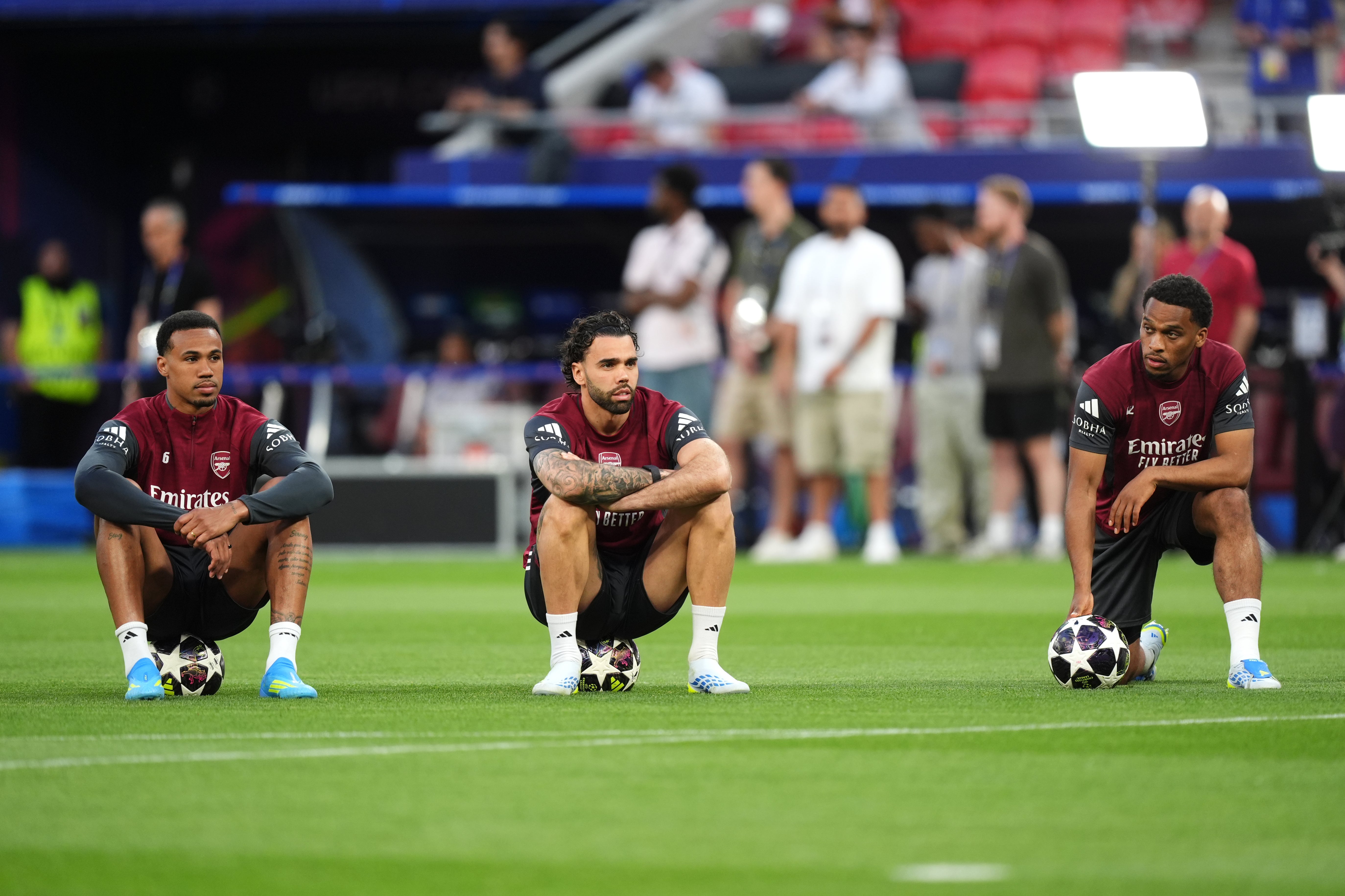 Arsenal's Gabriel Magalhaes, goalkeeper David Raya and Jurrien Timber during a training session