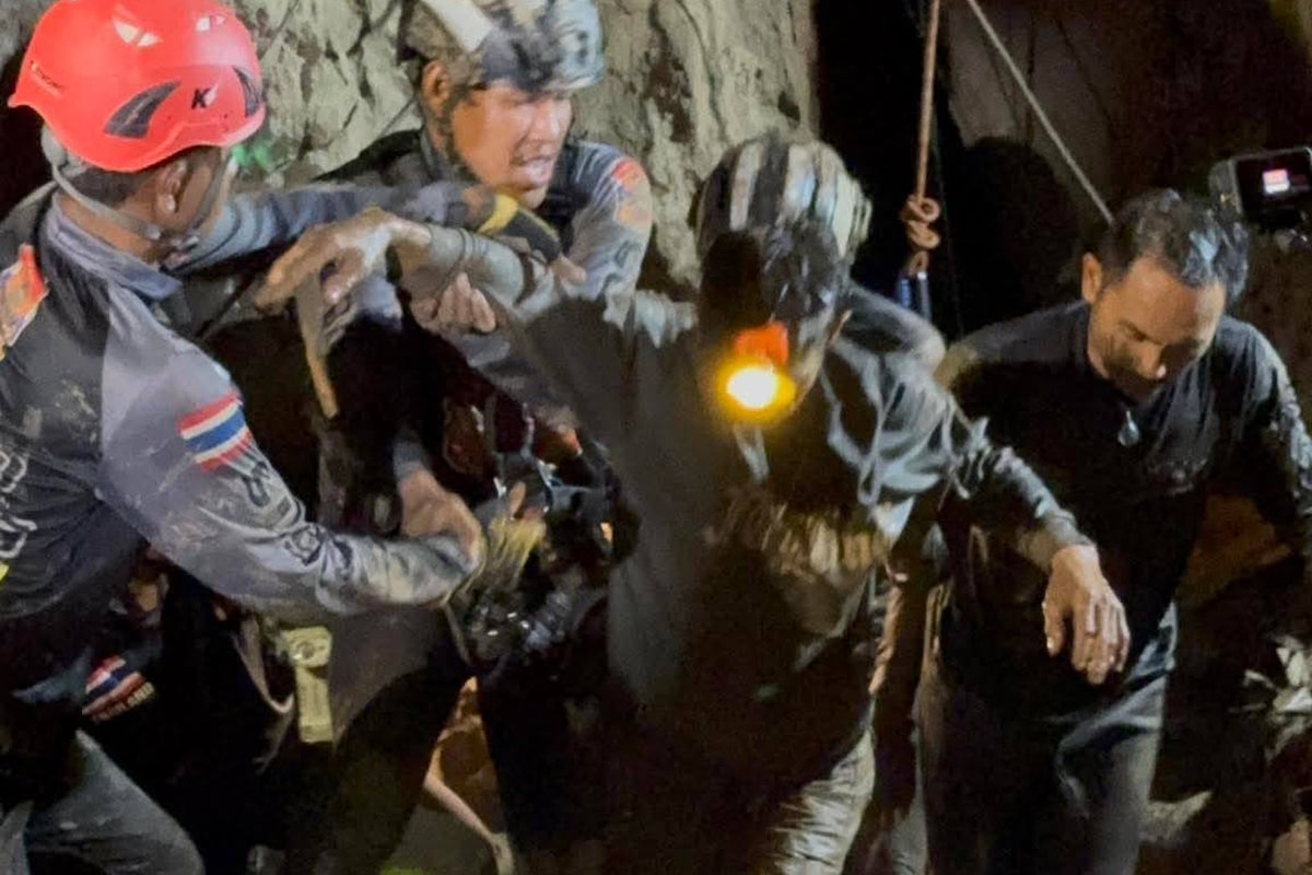 Four men trapped in flooded Laos cave saved day after first survivor freed