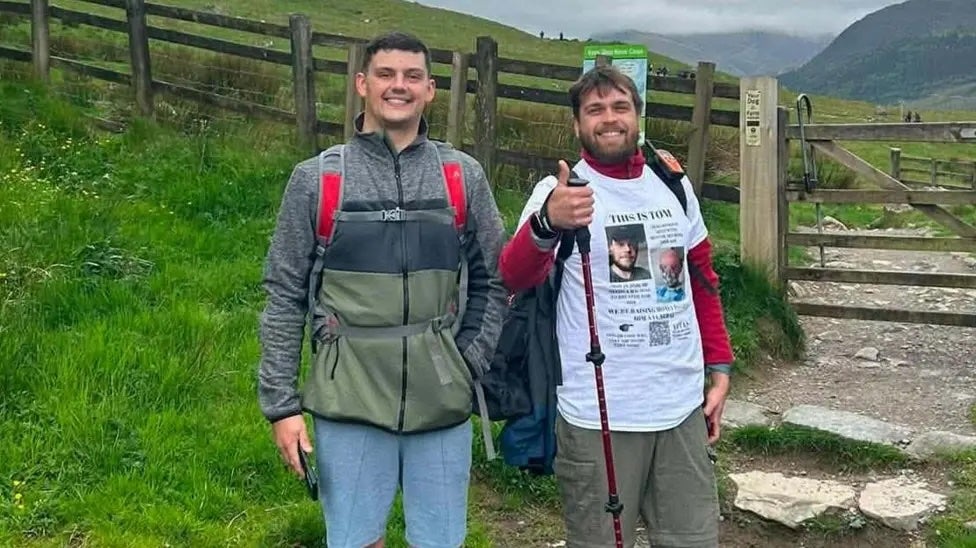 Rows break out as hikers jostle to reach the top of Snowdon