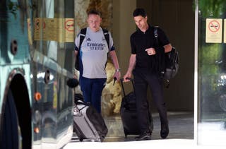 Arsenal manager Mikel Arteta (right) leaving the team hotel in Budapest