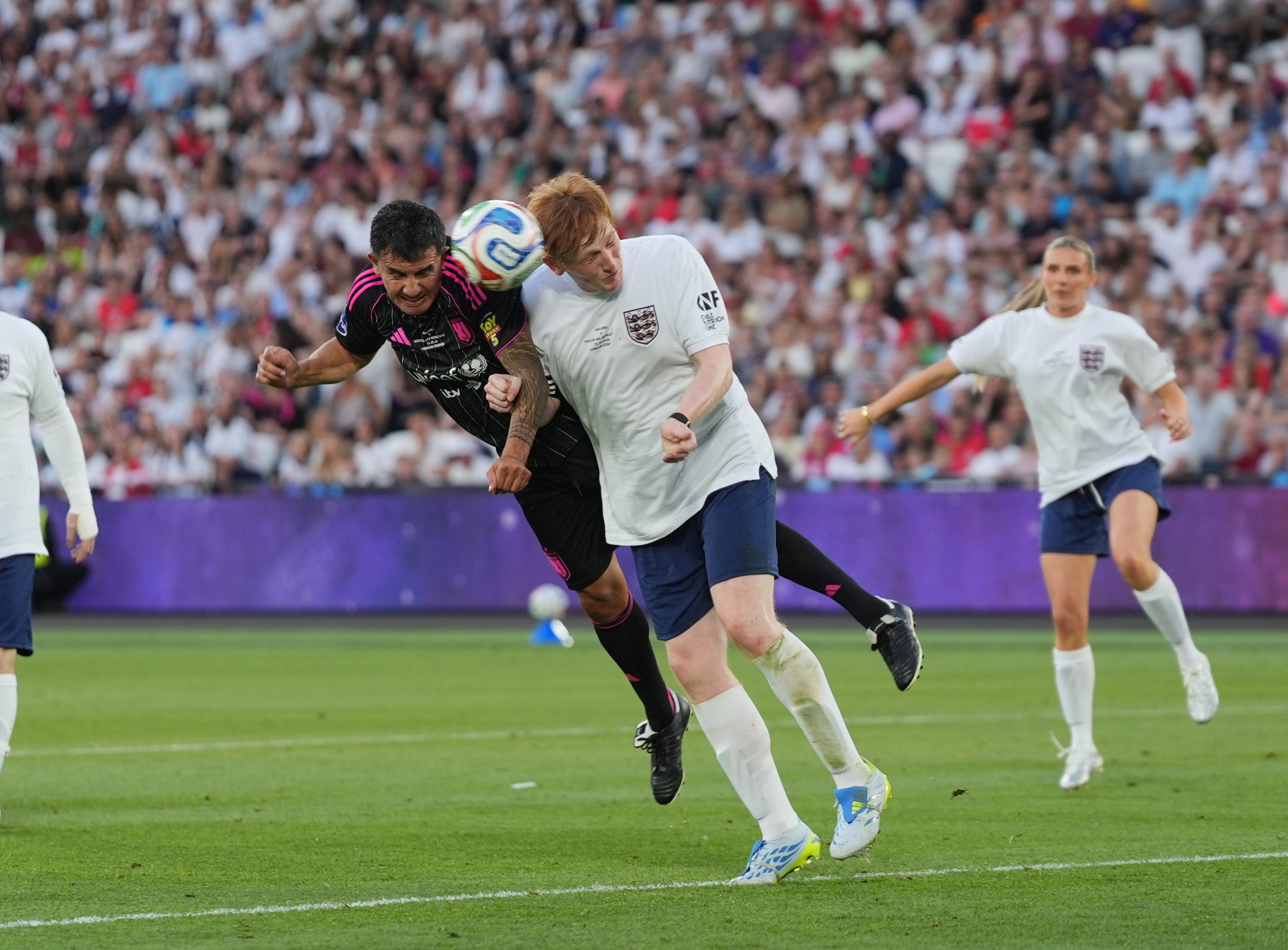 World XI's Tim Cahill scores their side's second goal of the game during Soccer Aid for UNICEF (PA)