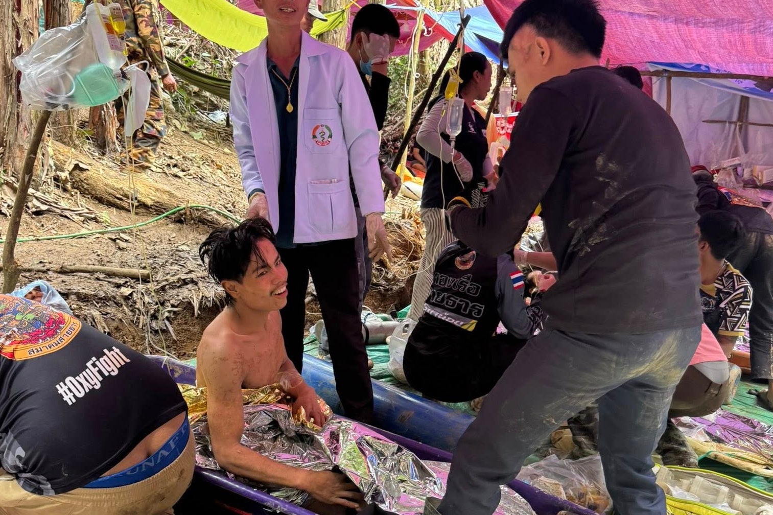 This image provided by the Association of Volunteers for Lao People, shows rescuers after they safely evacuated the villagers, who had been trapped in a cave in Xaisomboun province, Laos, Saturday, 30 May 2026 (AP)