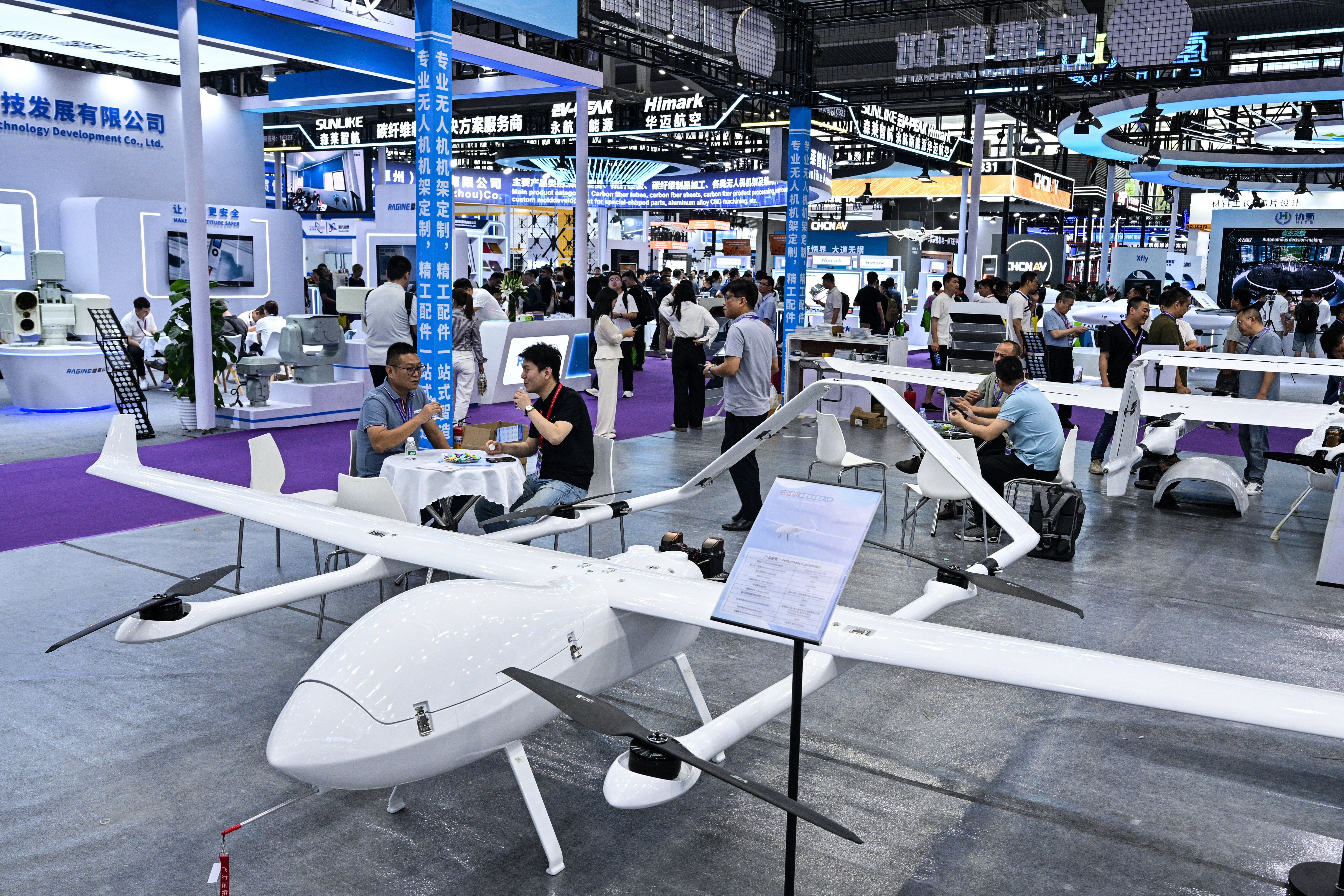 A MD-G62 fixed-wing VTOL (Vertical Take-Off and Landing) UAV of Ming is displayed