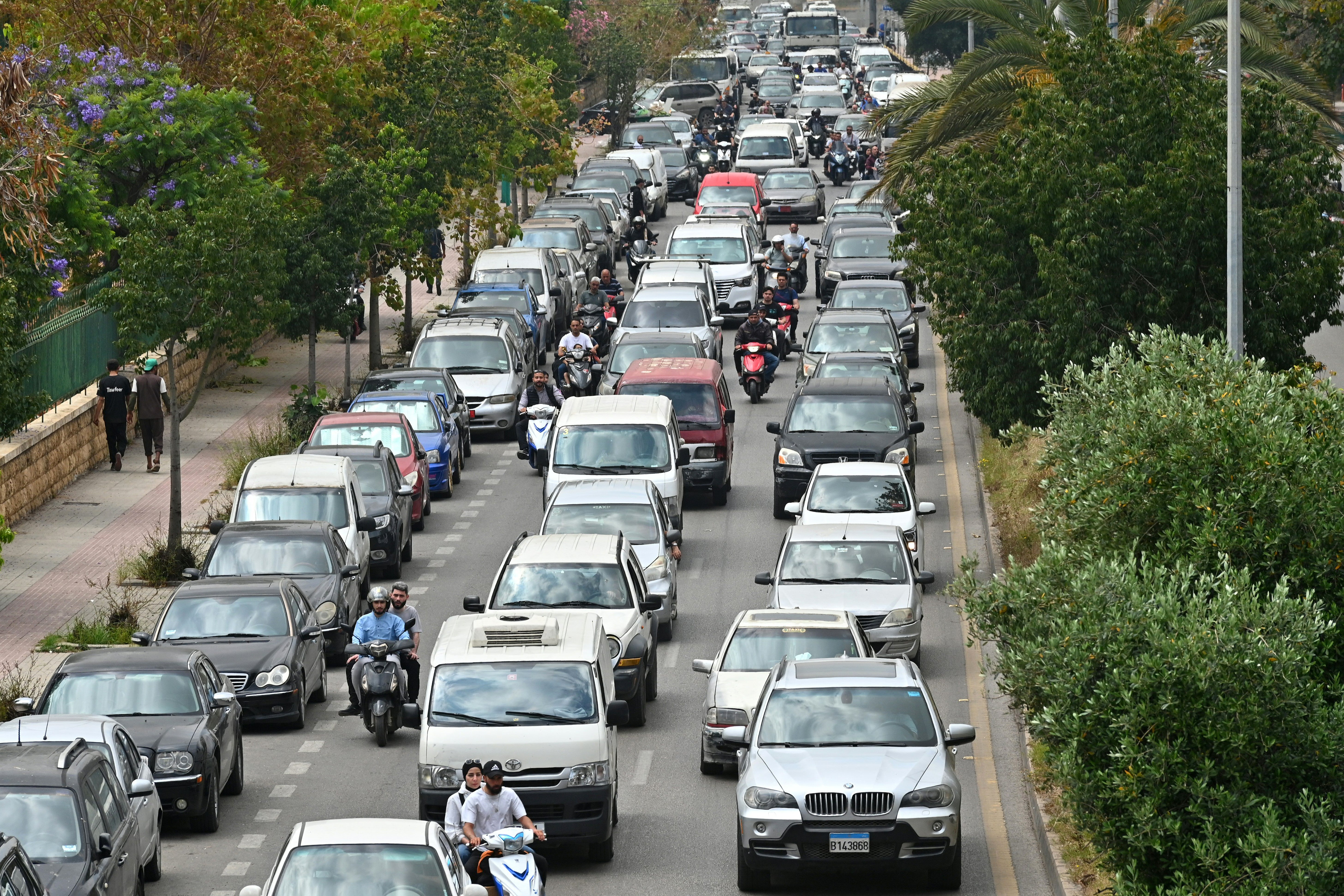 Residents flee their homes after Israel ordered attacks on the southern suburbs of Lebanon's capital Beirut on June 1, 2026. (AFP/Getty)