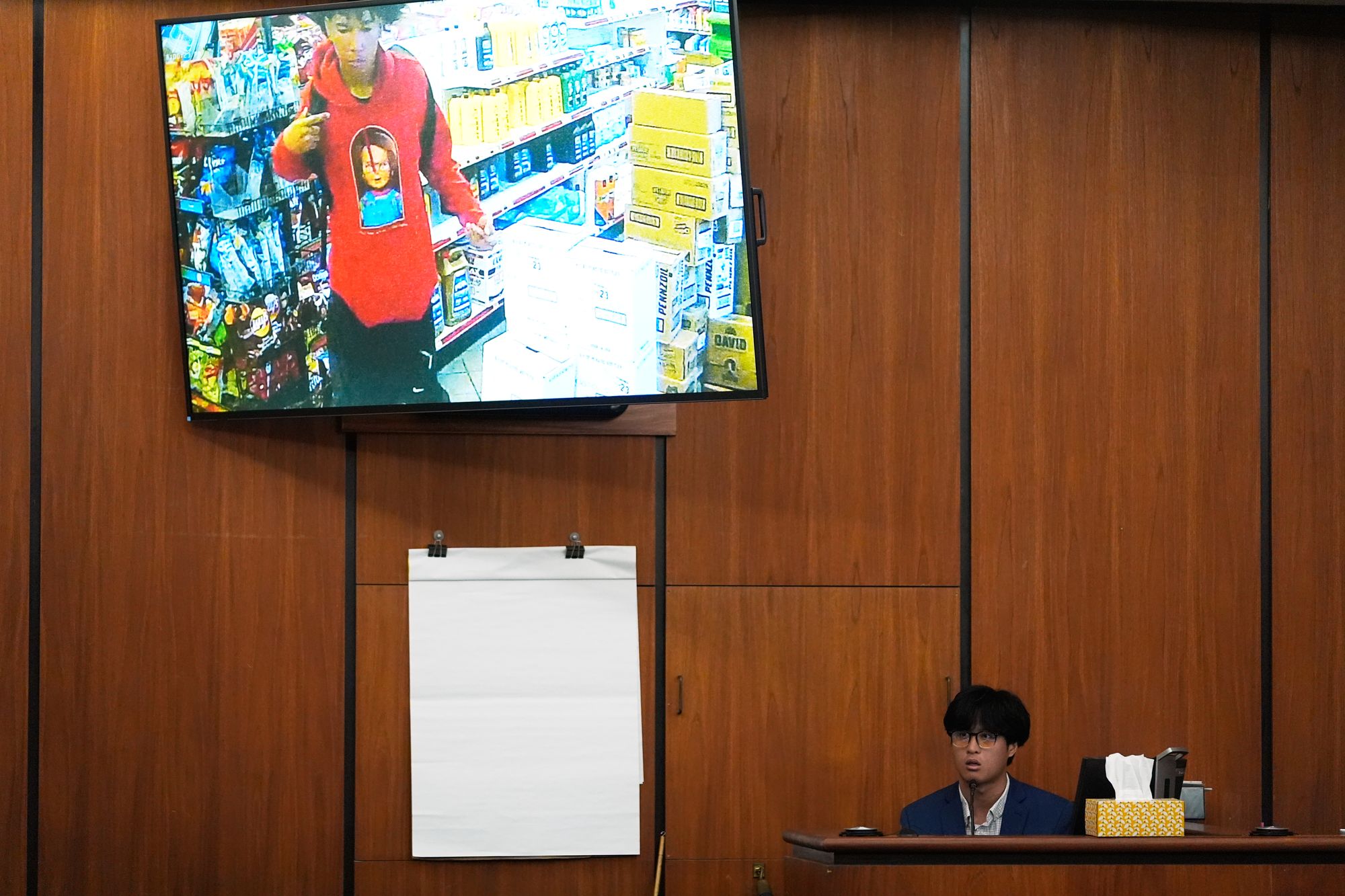 Andy Chow testifies as a defense witness in the murder trial against his father Chikei Rick Chow (AP Photo/Erik Verduzco)