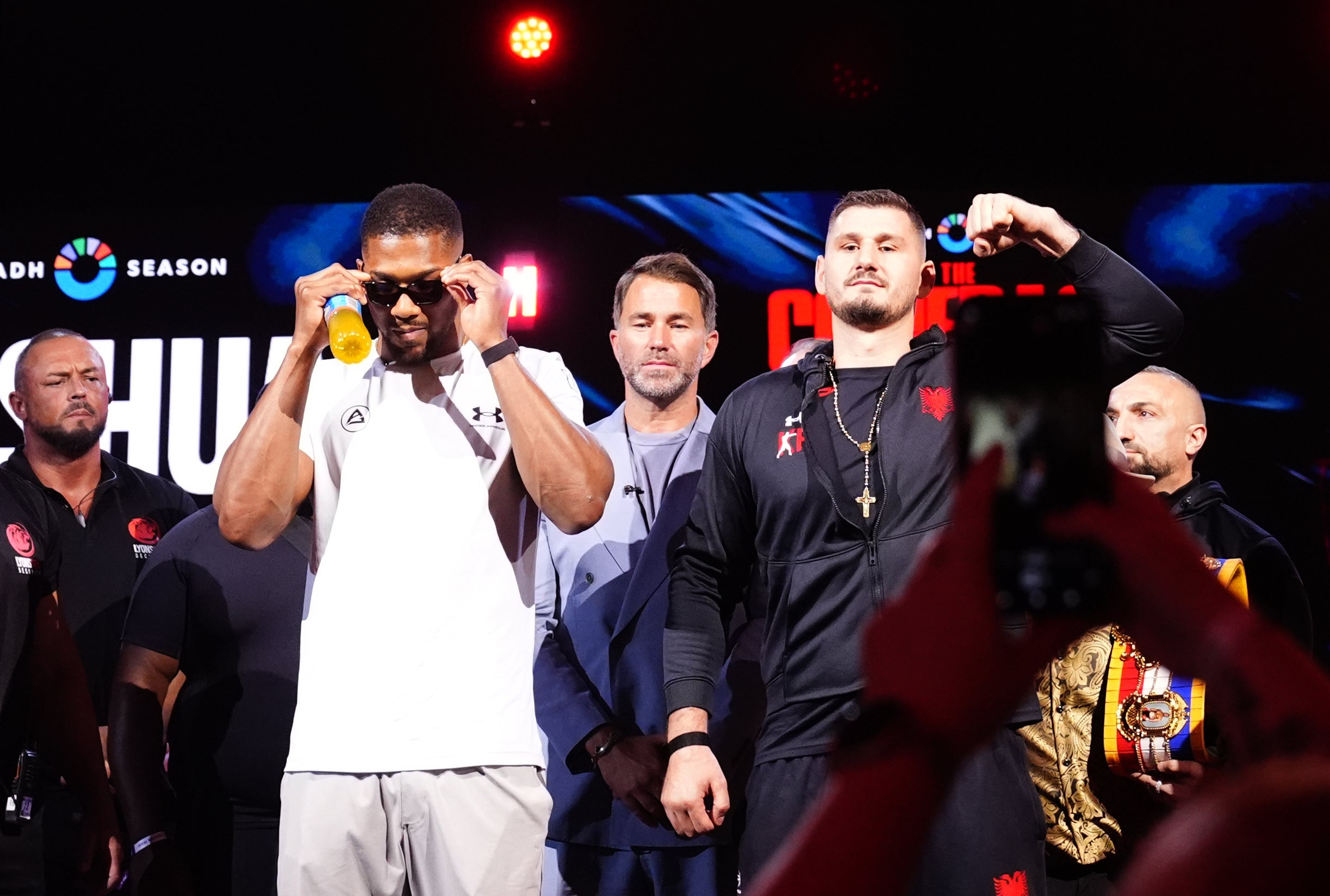 Anthony Joshua, left, and Kristian Prenga faced off in London (John Walton/PA)