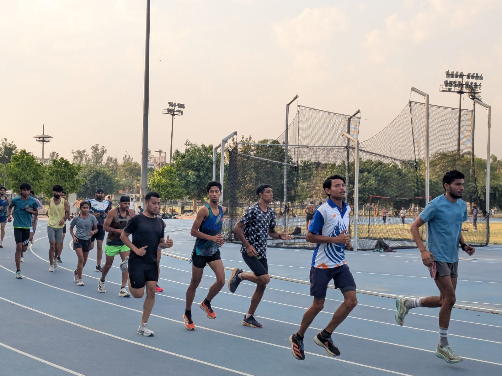 Athletes practicing in Delhi's Jawaharlal Nehru Stadium