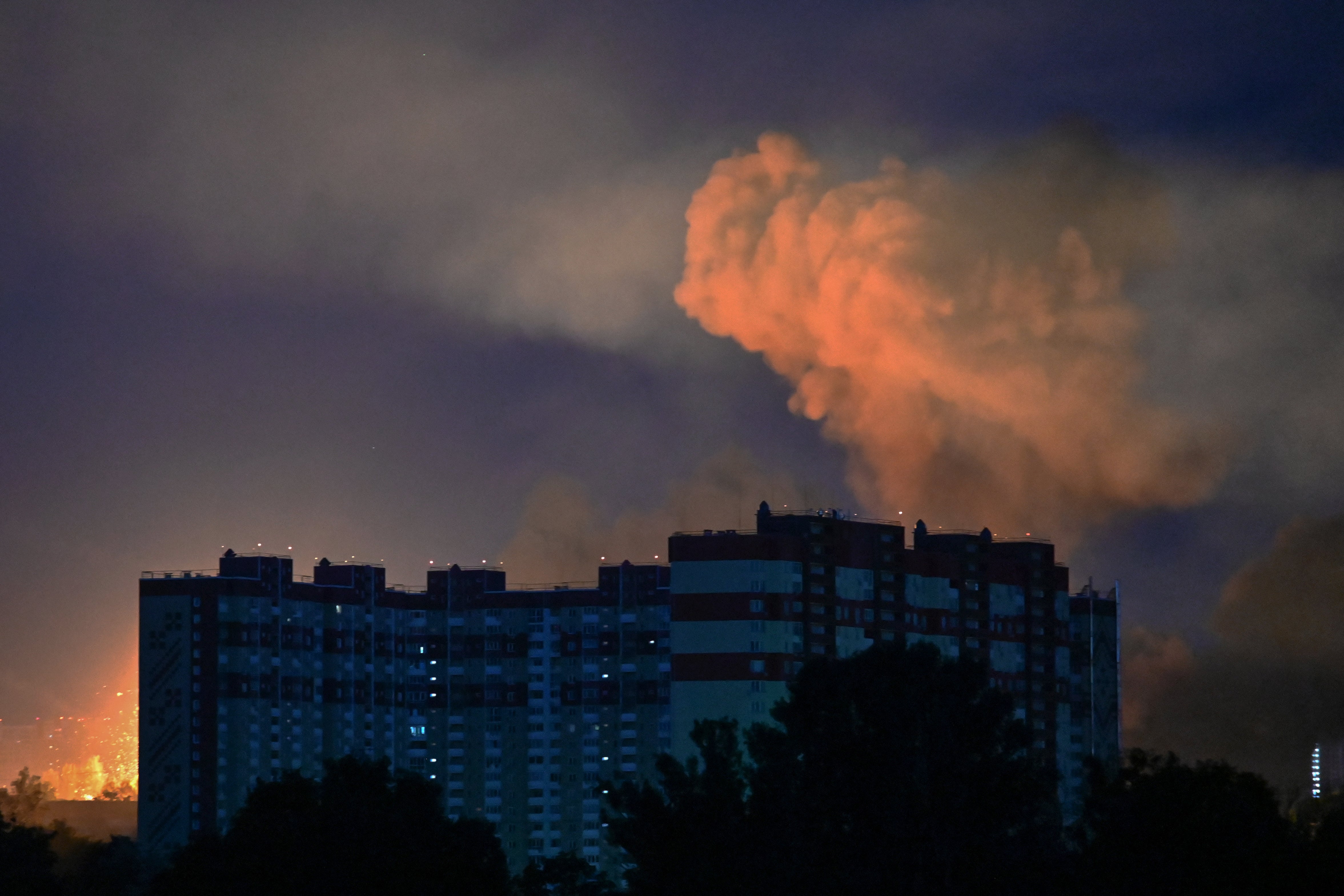 Huge cloud of smoke rises after an explosion from drone and missile attacks in Kyiv