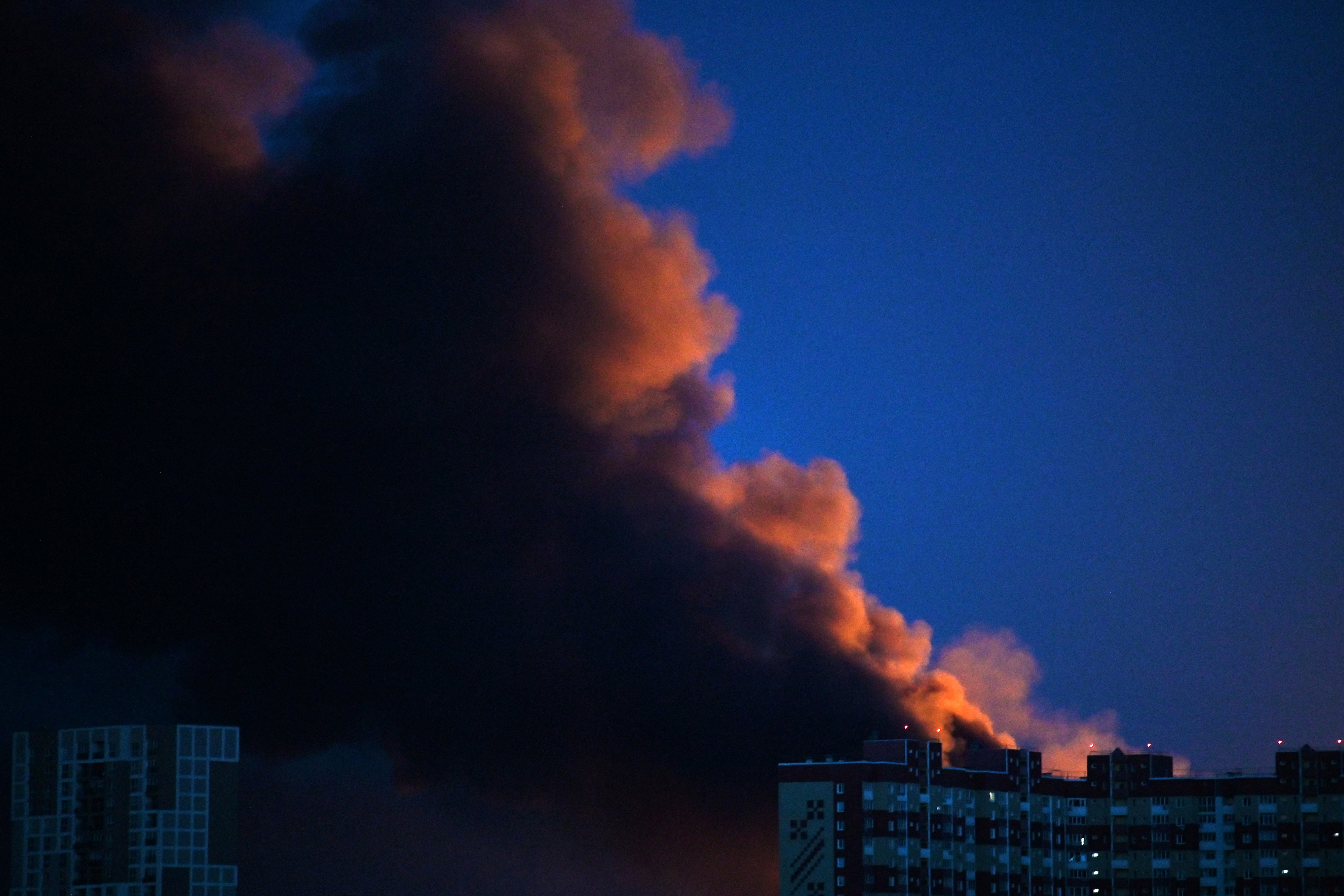 Smoke seen rising from a building following Russian missile strikes in Kyiv (AFP/Getty)