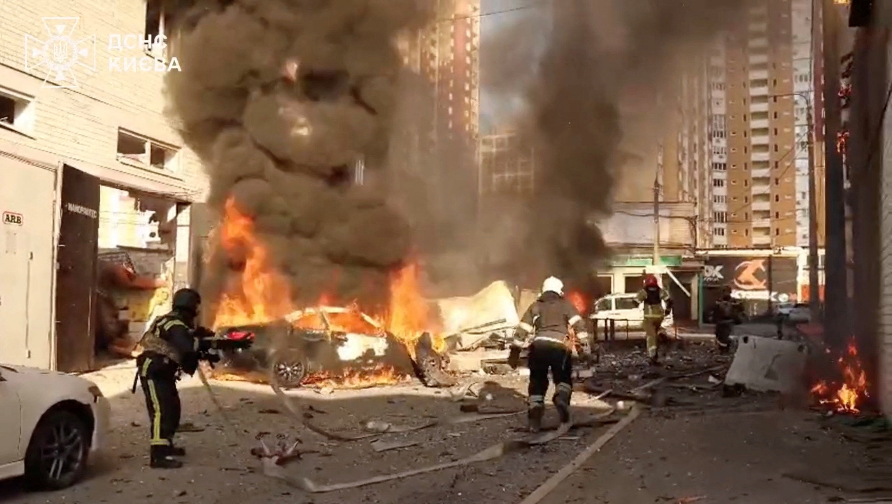 Firefighters work at the aftermath of a Russian attack in Kyiv, on 2 June (Reuters)