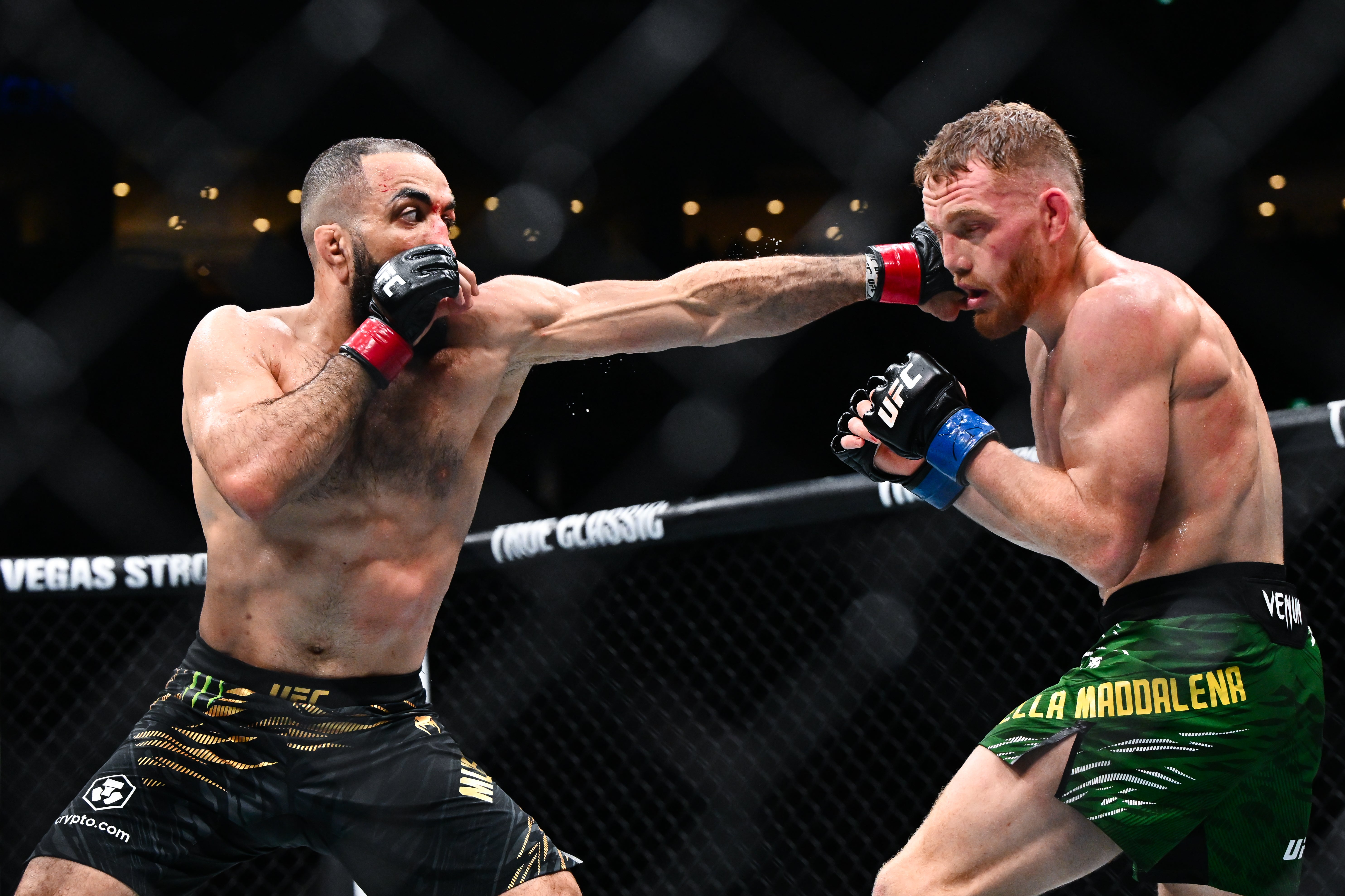 Belal Muhammad (left) during his UFC title loss to Jack Della Maddalena in 2025